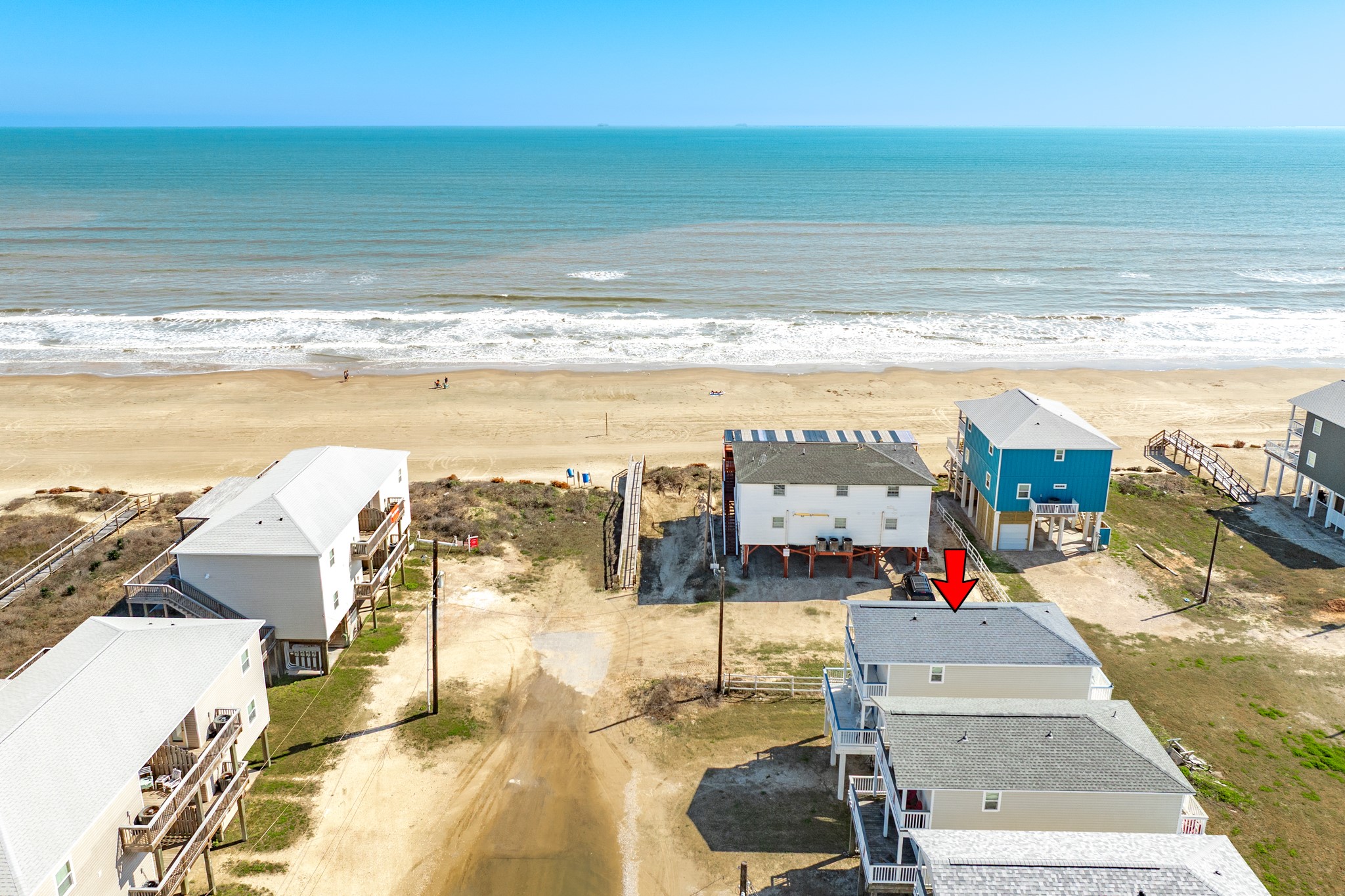 107 Howard Avenue Surfside Beach, TX 77541 - Photo 9 of 38 Enjoy close proximity to the sand and surf with expansive Gulf views just steps away from the property.