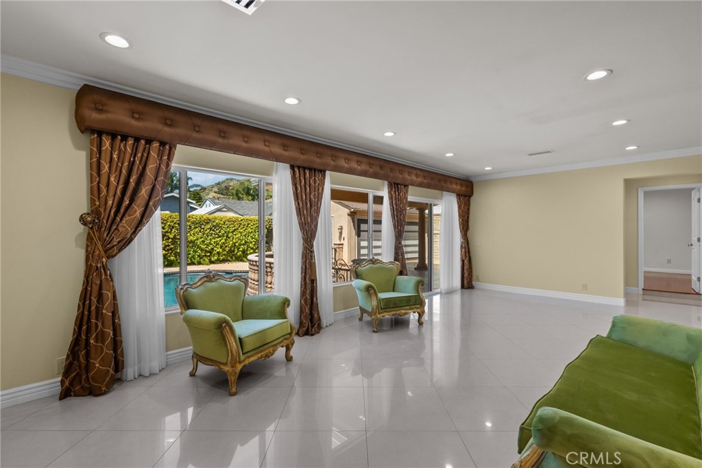 931 University Avenue Burbank, CA 91504 - Photo 35 of 49 a living room with furniture and a floor to ceiling window