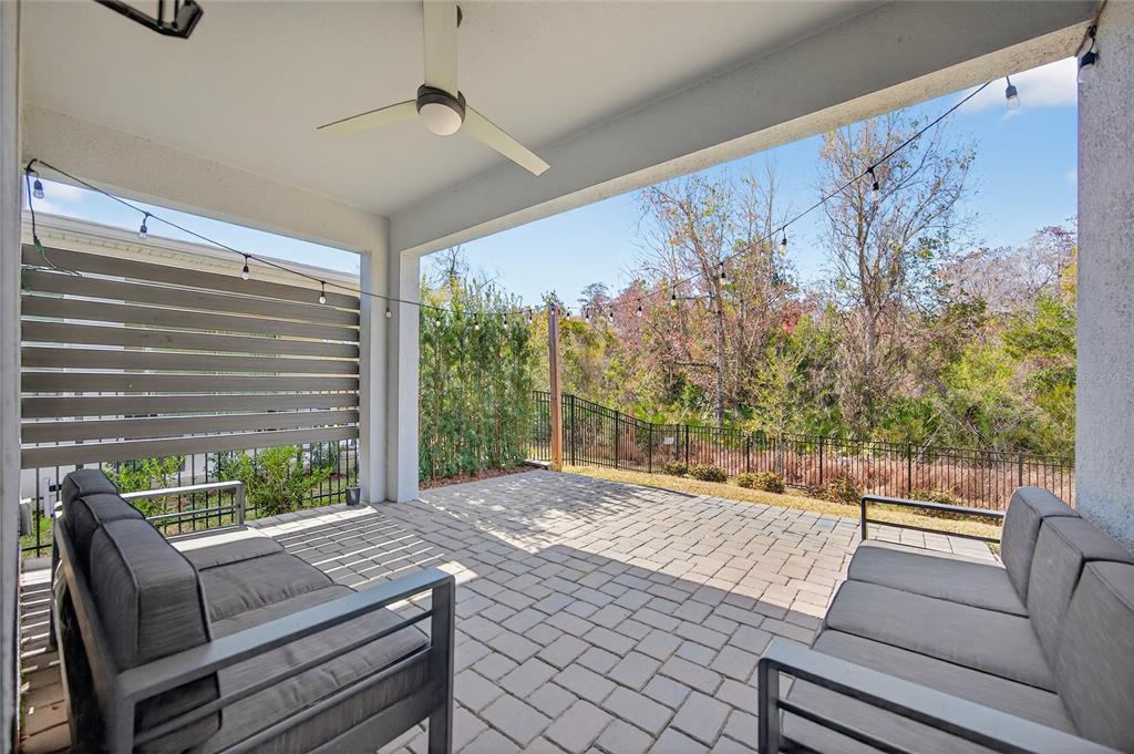 11128 Lore Way Orlando, FL 32832 - Photo 55 of 79 a living room with furniture and a large window