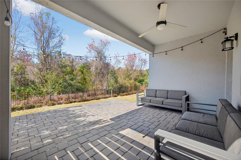 11128 Lore Way Orlando, FL 32832 - Photo 56 of 79 a living room with furniture and a outdoor space