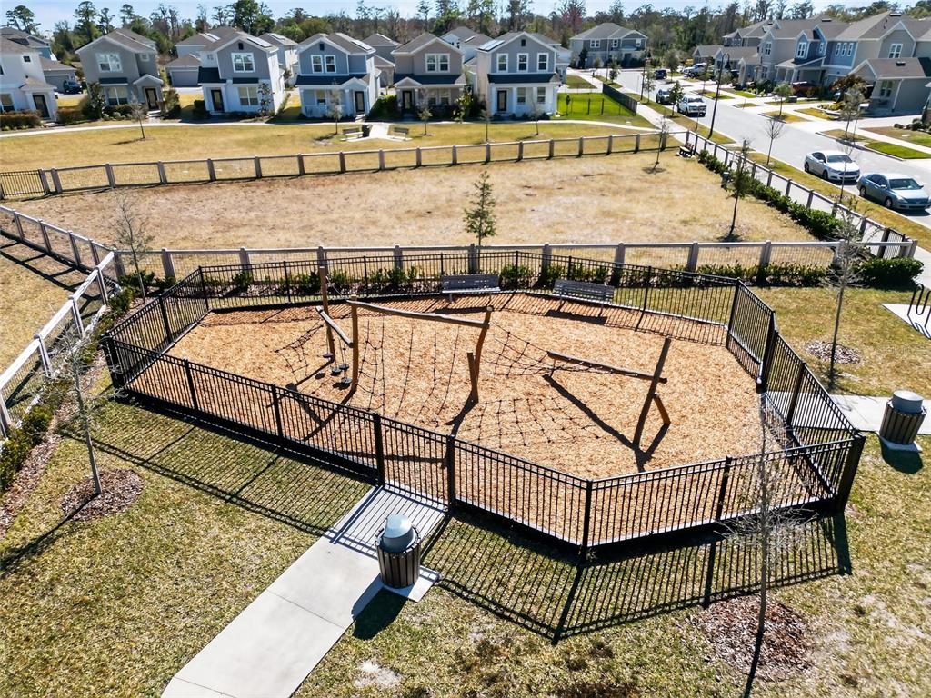 11128 Lore Way Orlando, FL 32832 - Photo 73 of 79 a view of a swimming pool with a lounge chairs