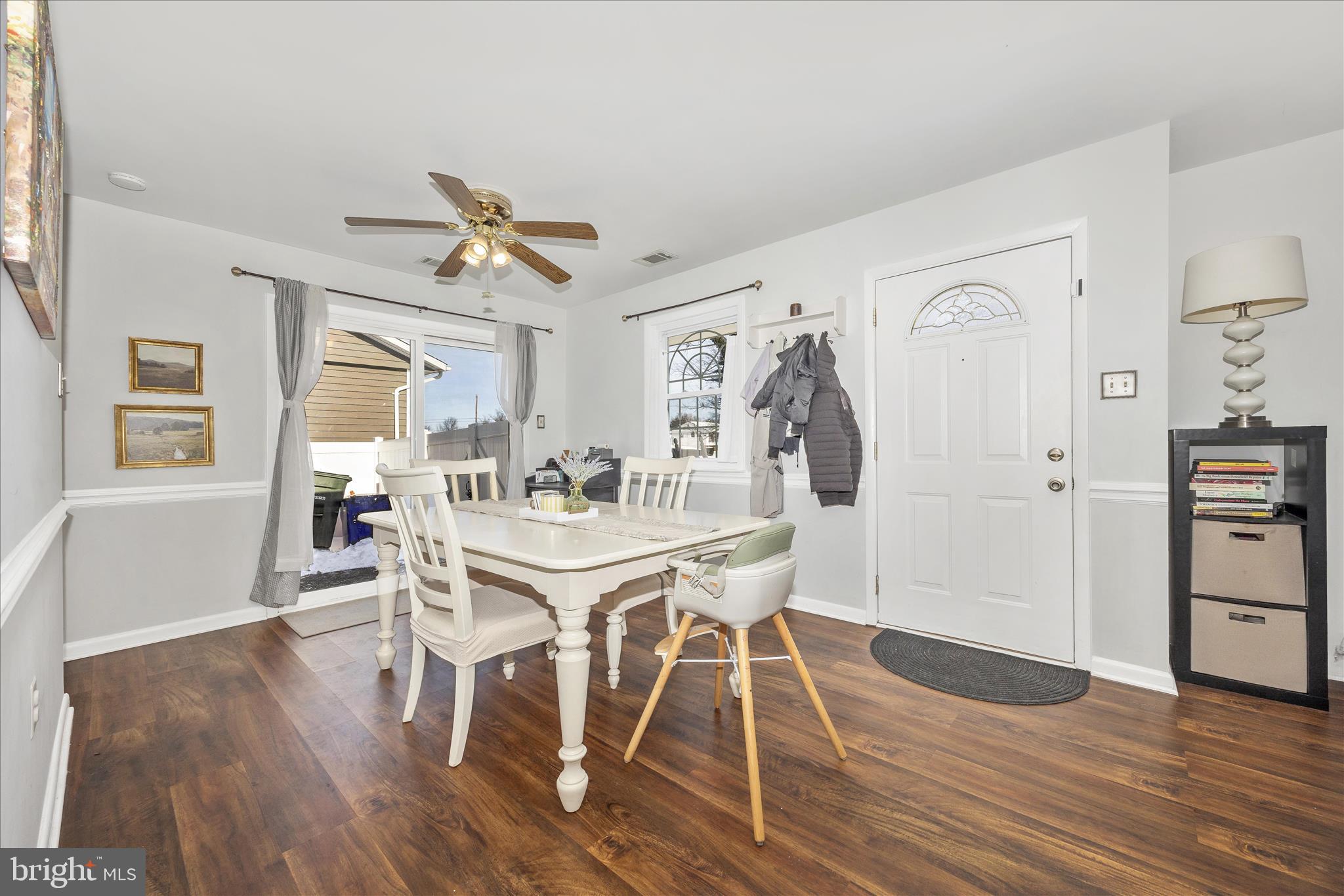 439 Center Street Frederick, MD 21701 - Photo 15 of 49 a view of a dining room with furniture and wooden floor