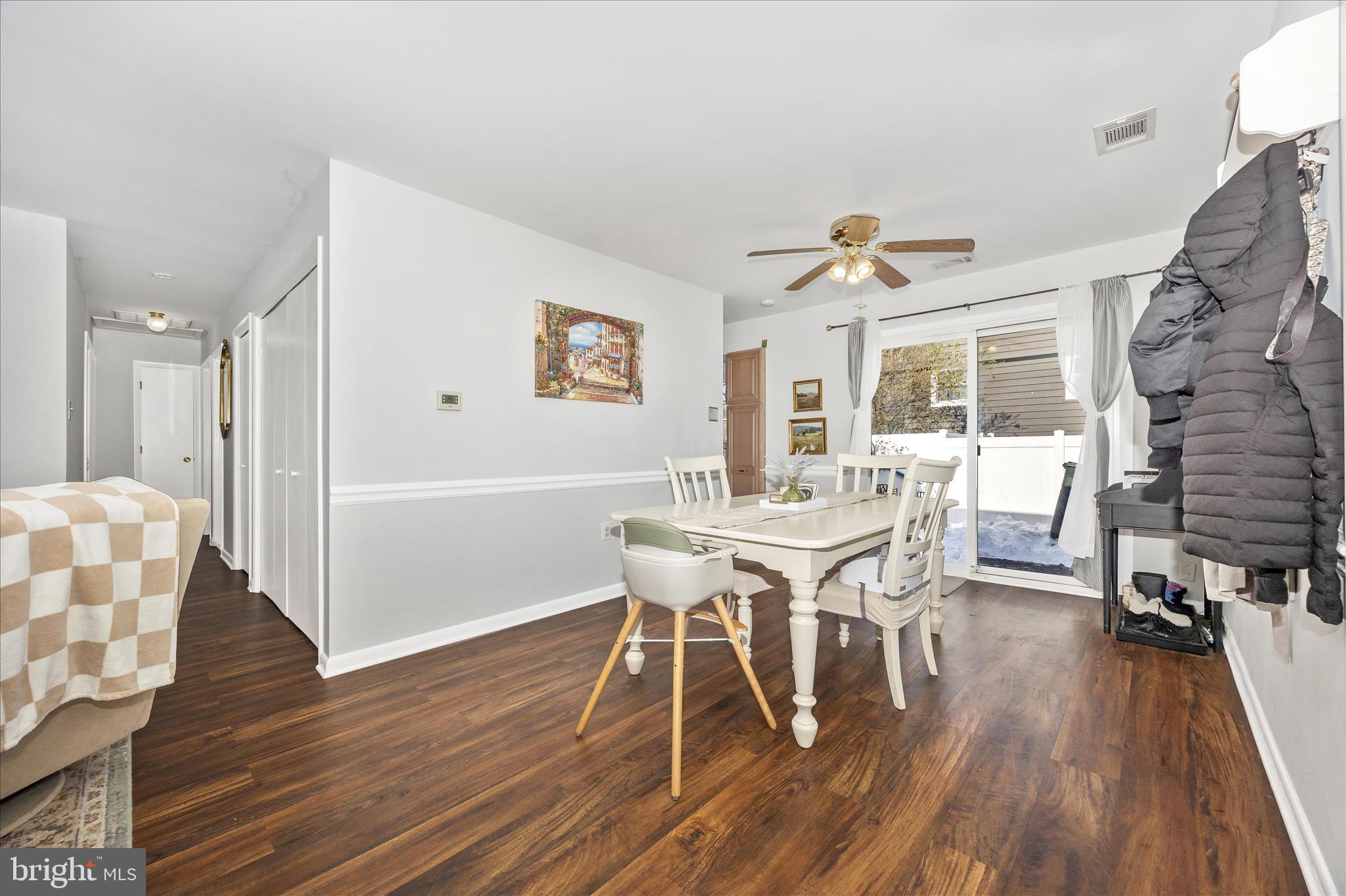 439 Center Street Frederick, MD 21701 - Photo 16 of 49 a view of a dining room with furniture and wooden floor
