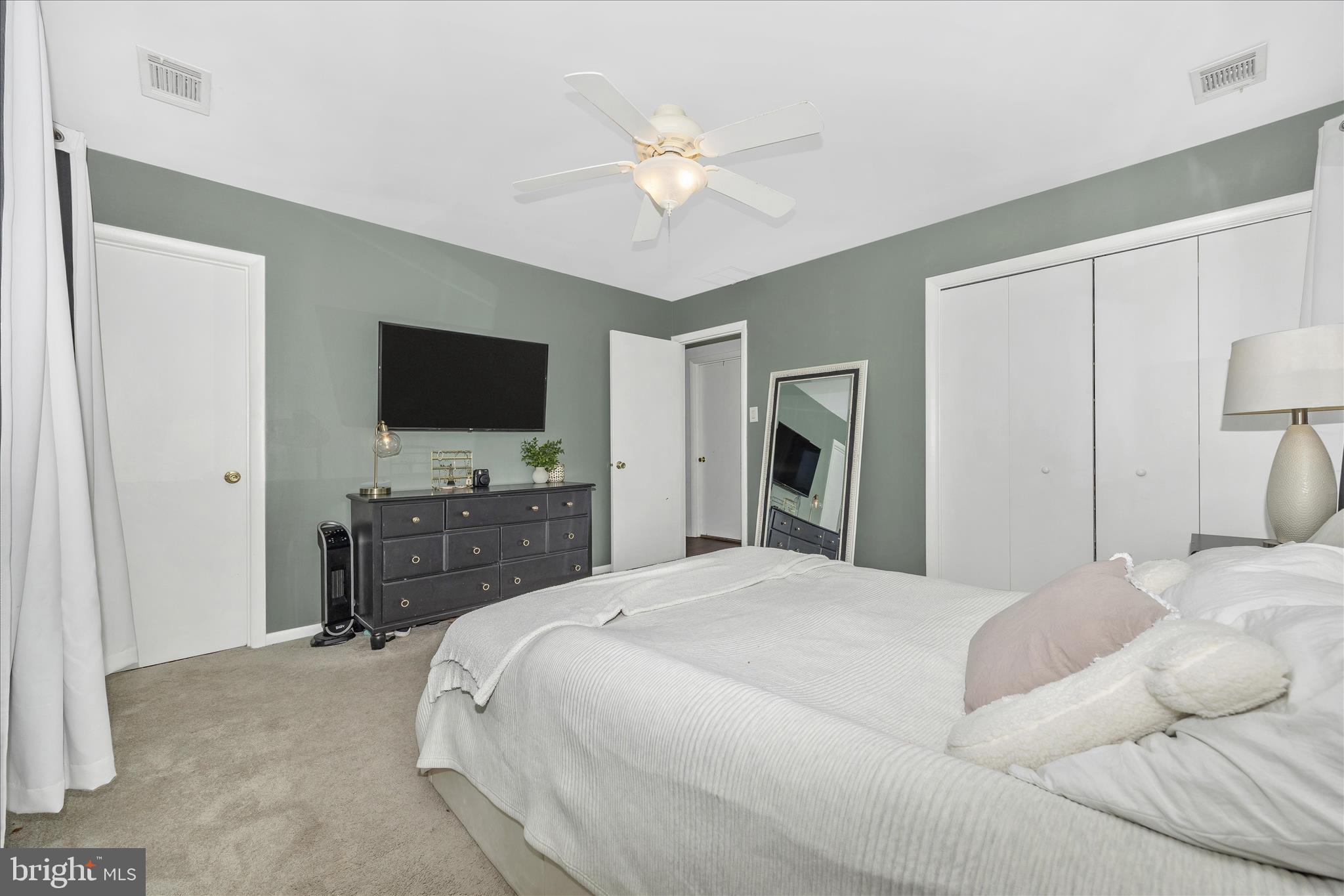 439 Center Street Frederick, MD 21701 - Photo 31 of 49 a bedroom with a bed and a flat screen tv
