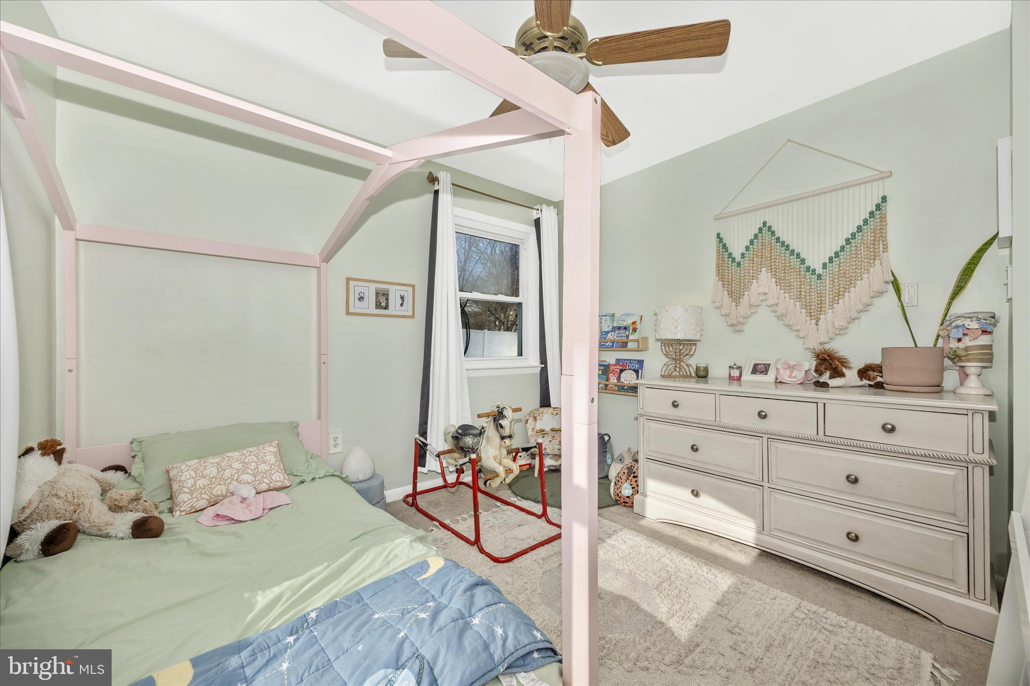 439 Center Street Frederick, MD 21701 - Photo 38 of 49 a bedroom with a bed and a dresser