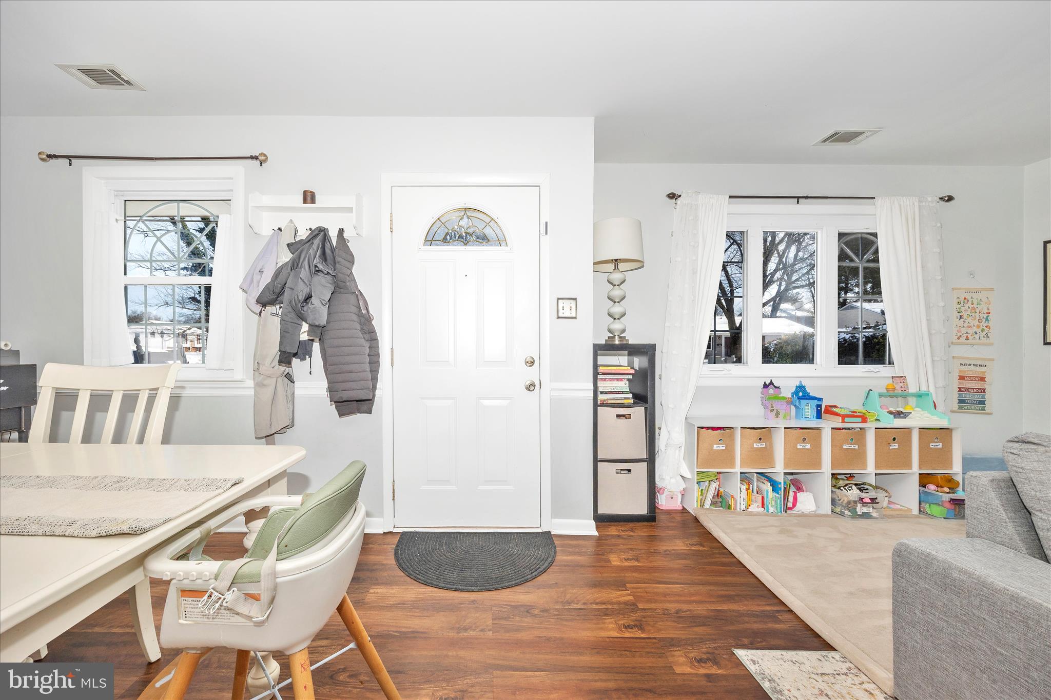 439 Center Street Frederick, MD 21701 - Photo 4 of 49 a living room with furniture and large windows