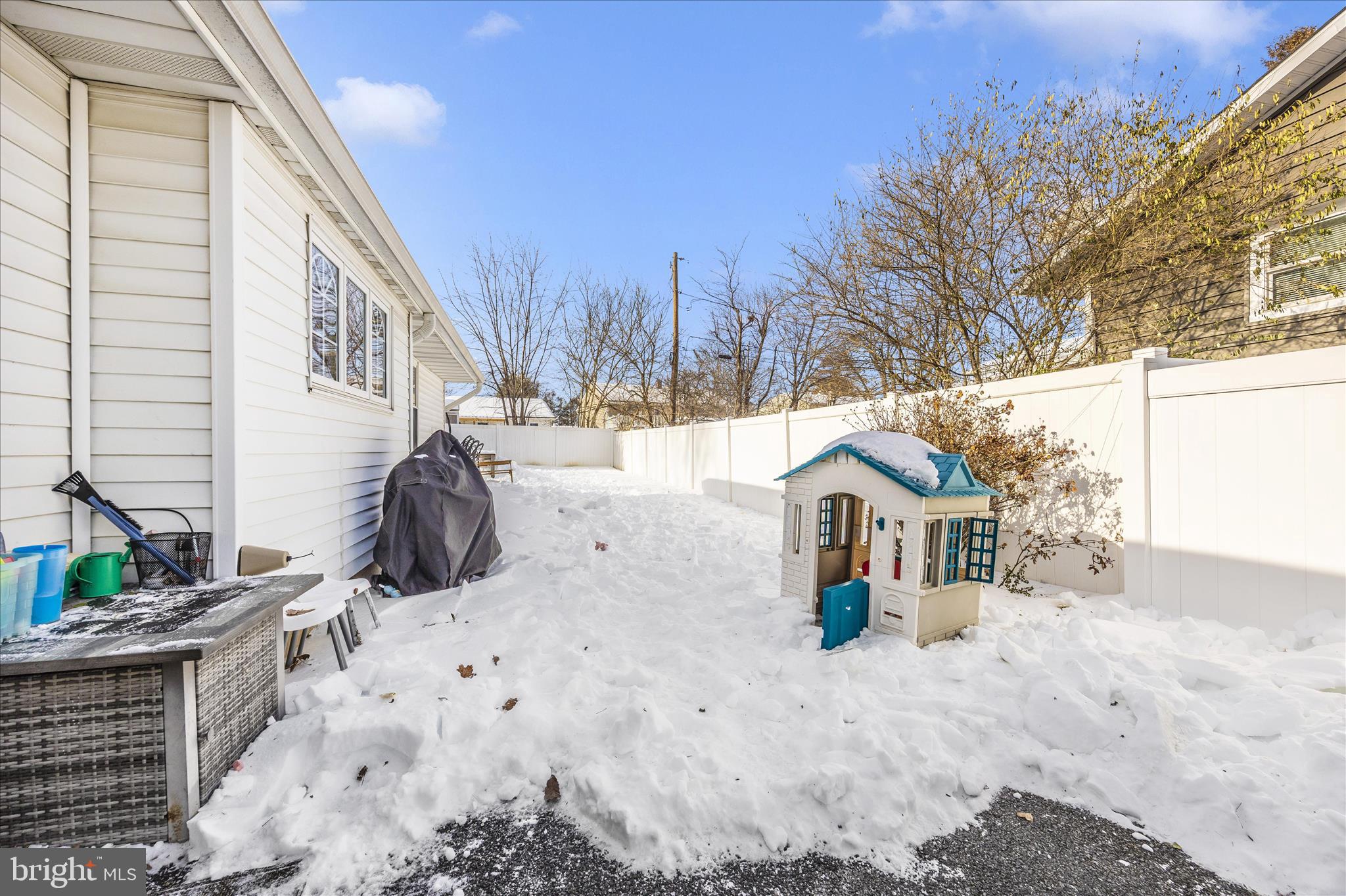 439 Center Street Frederick, MD 21701 - Photo 44 of 49 a view of roof covered with snow in front of house