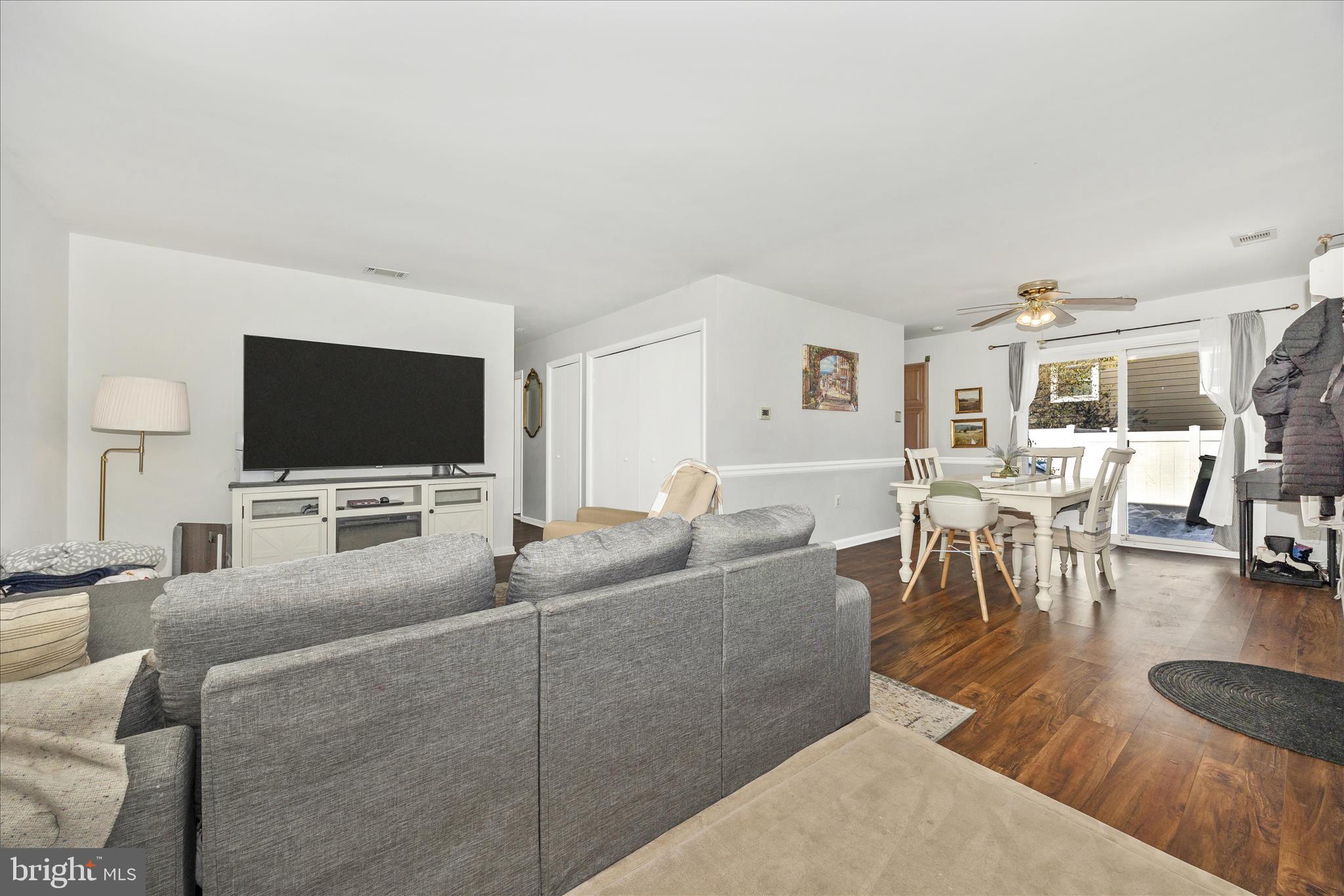 439 Center Street Frederick, MD 21701 - Photo 9 of 49 a living room with furniture and a flat screen tv