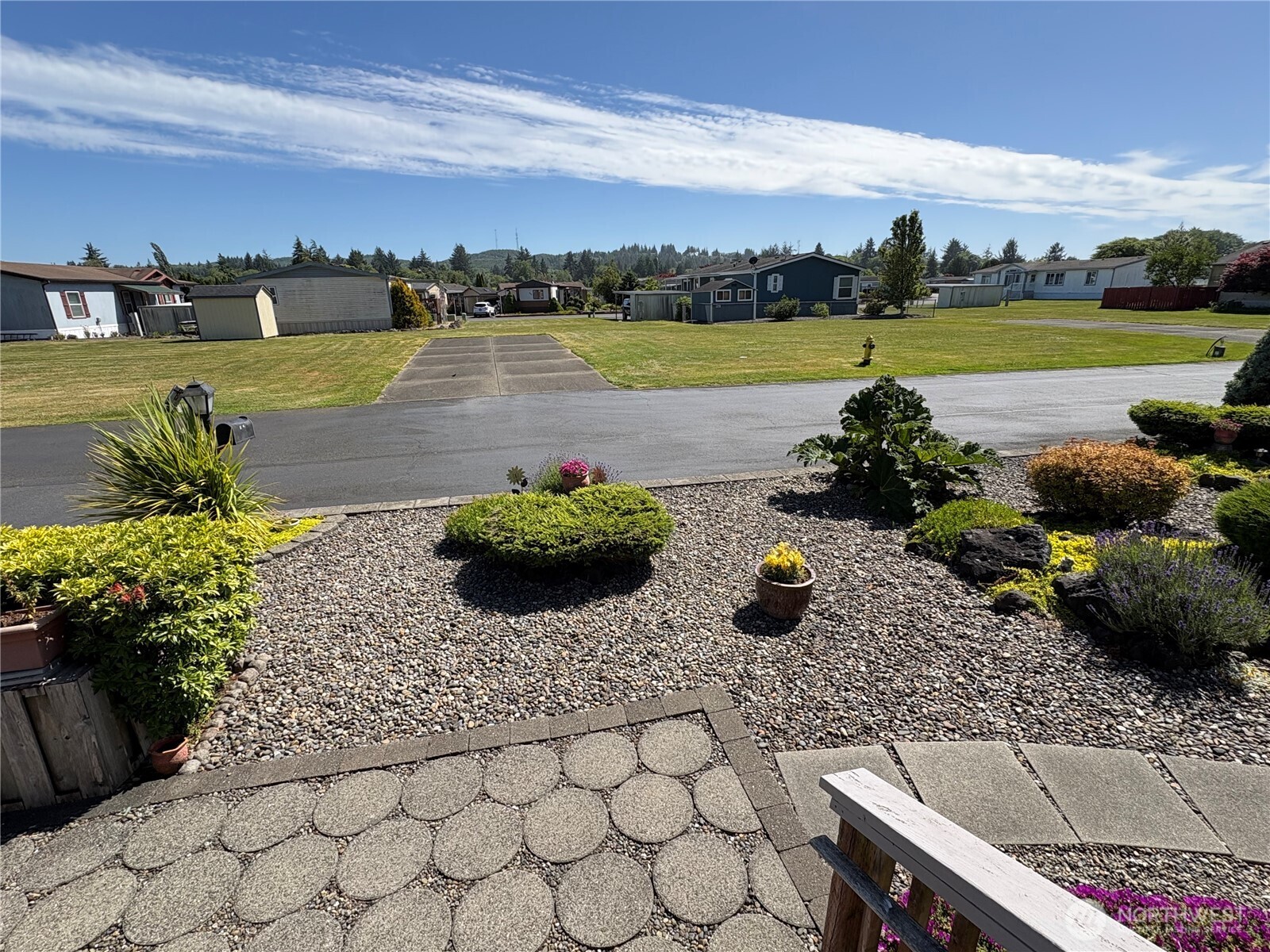 51 Meander Way Aberdeen, WA 98520 - Photo 19 of 22 a view of a lake with a table and chairs