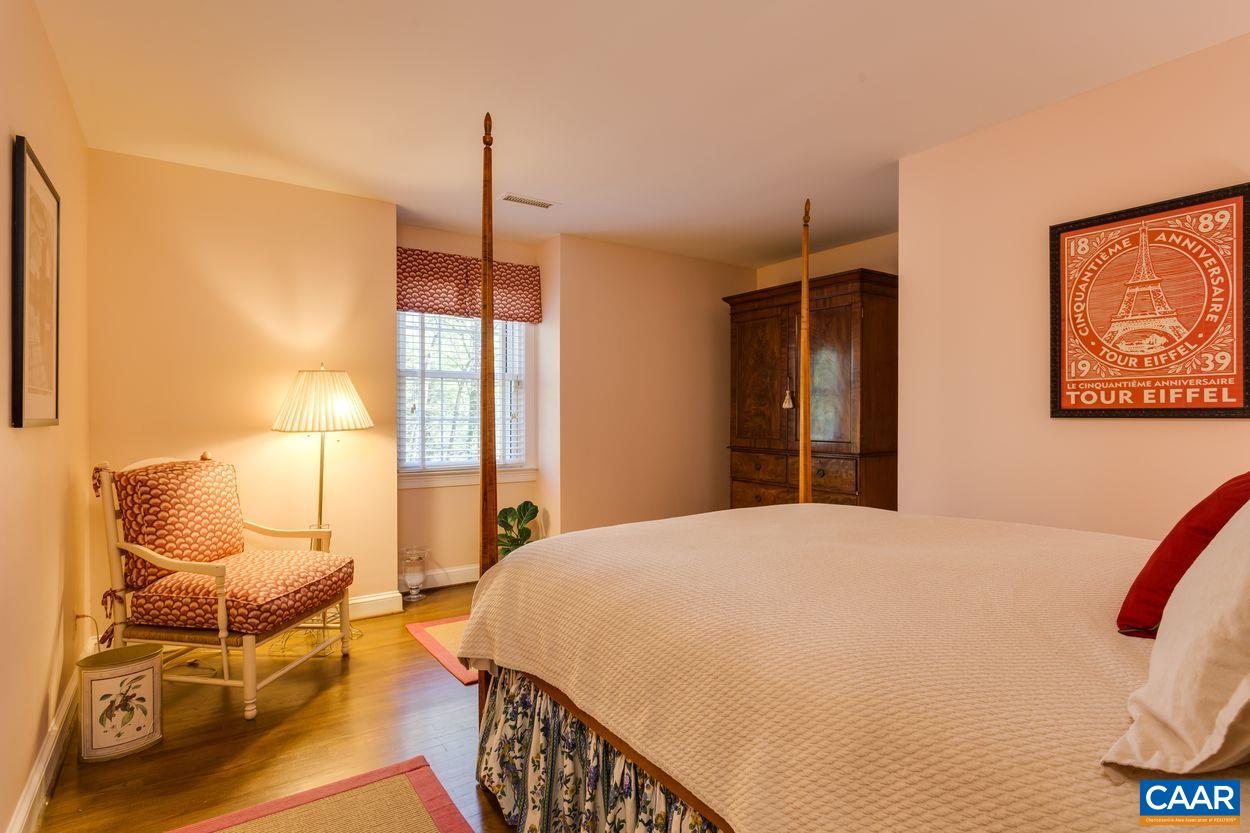 788 Tanglewood Road Charlottesville, VA 22901 - Photo 25 of 39 a bedroom with a bed and furniture