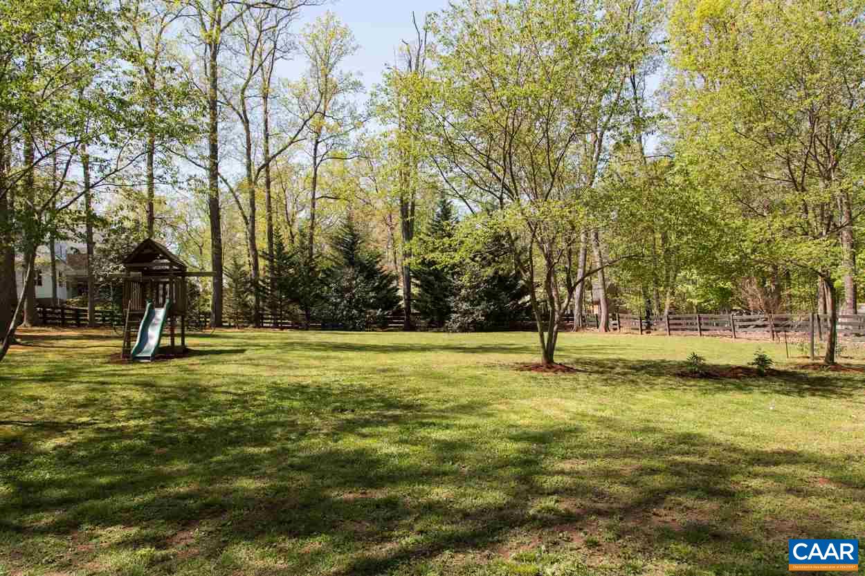 788 Tanglewood Road Charlottesville, VA 22901 - Photo 36 of 39 a swimming pool with trees in the background