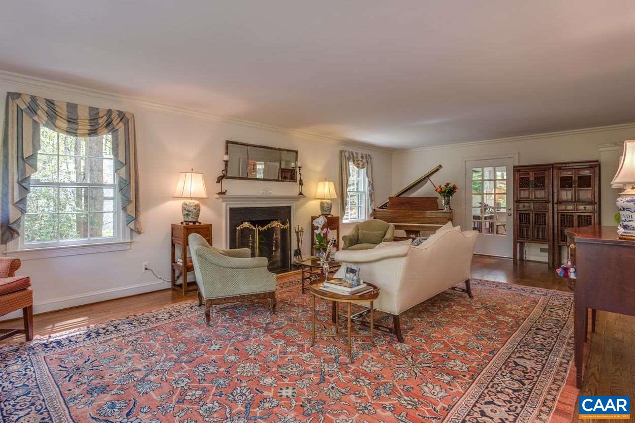 788 Tanglewood Road Charlottesville, VA 22901 - Photo 7 of 39 a living room with furniture and a fireplace