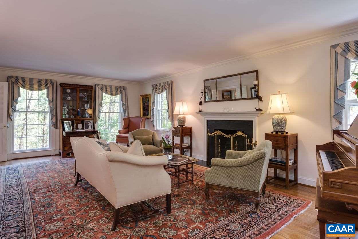 788 Tanglewood Road Charlottesville, VA 22901 - Photo 8 of 39 a living room with furniture and a fireplace