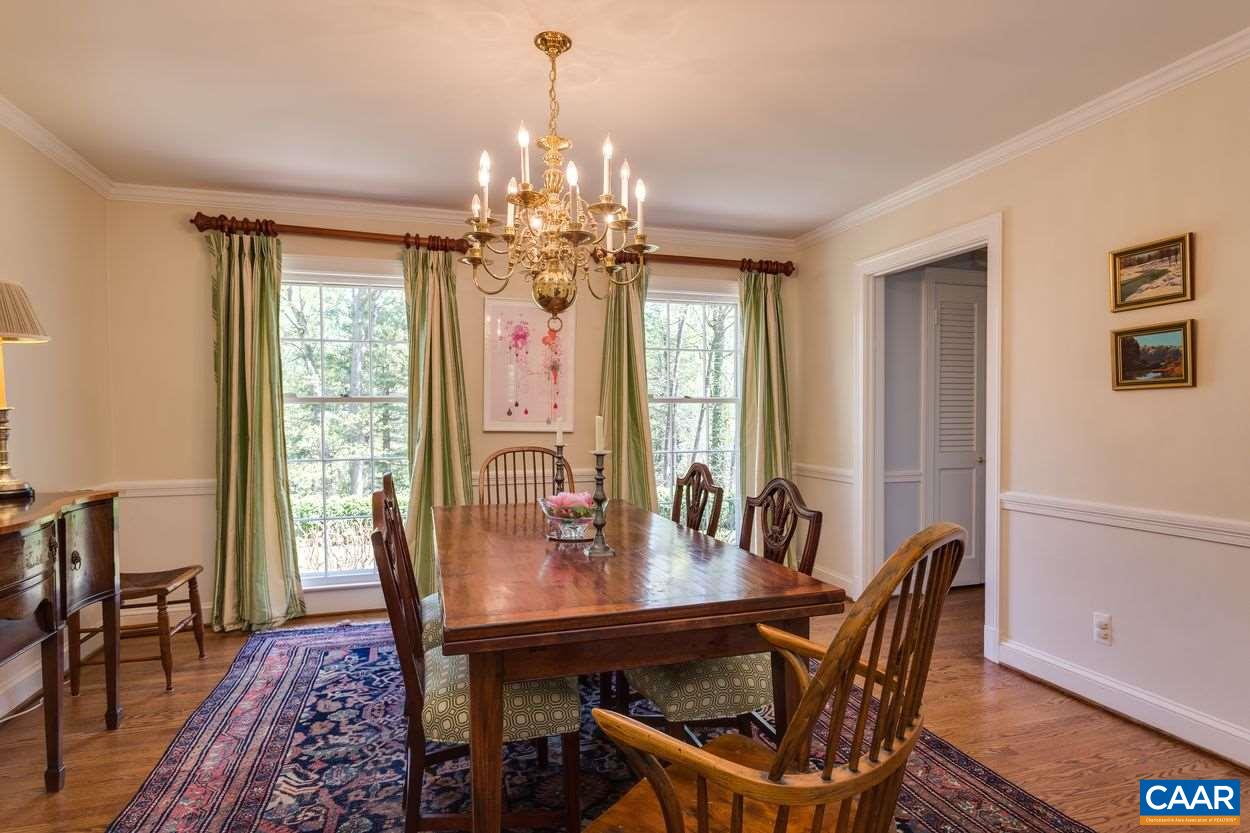 788 Tanglewood Road Charlottesville, VA 22901 - Photo 9 of 39 a view of a dining room with furniture window and wooden floor