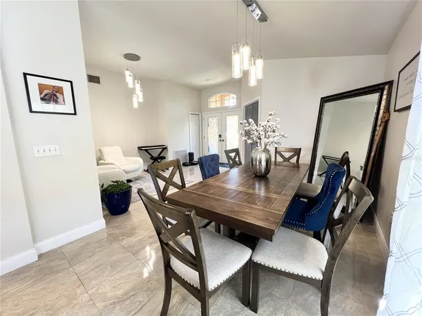 a view of a dining room with furniture