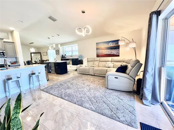 a living room with furniture and a couch