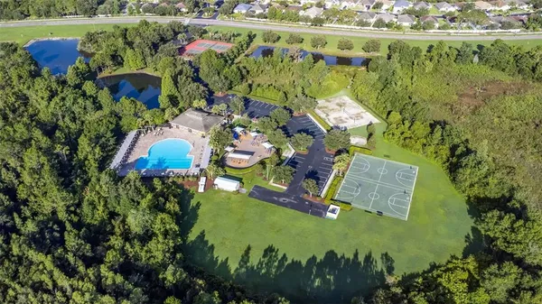an aerial view of a house with a garden