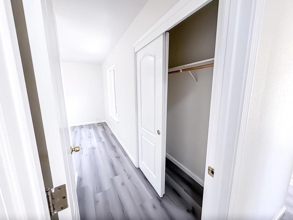 3005 Litt Road Modesto, CA 95355 - Photo 39 of 53 a view of a hallway with wooden floor and entryway