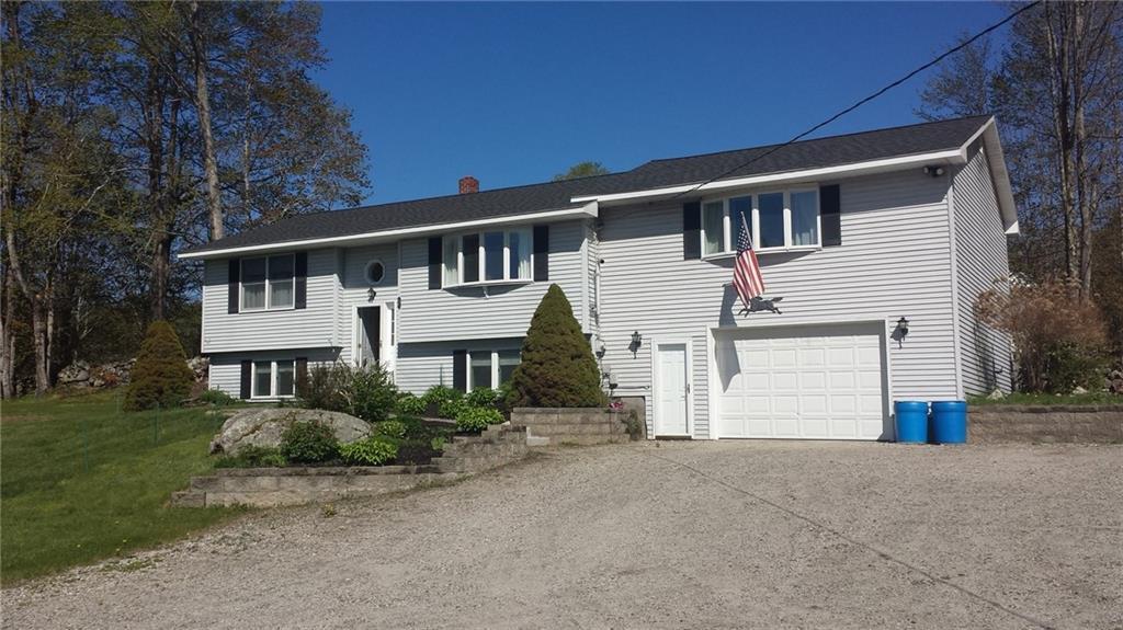 Stately view of home - garage with...