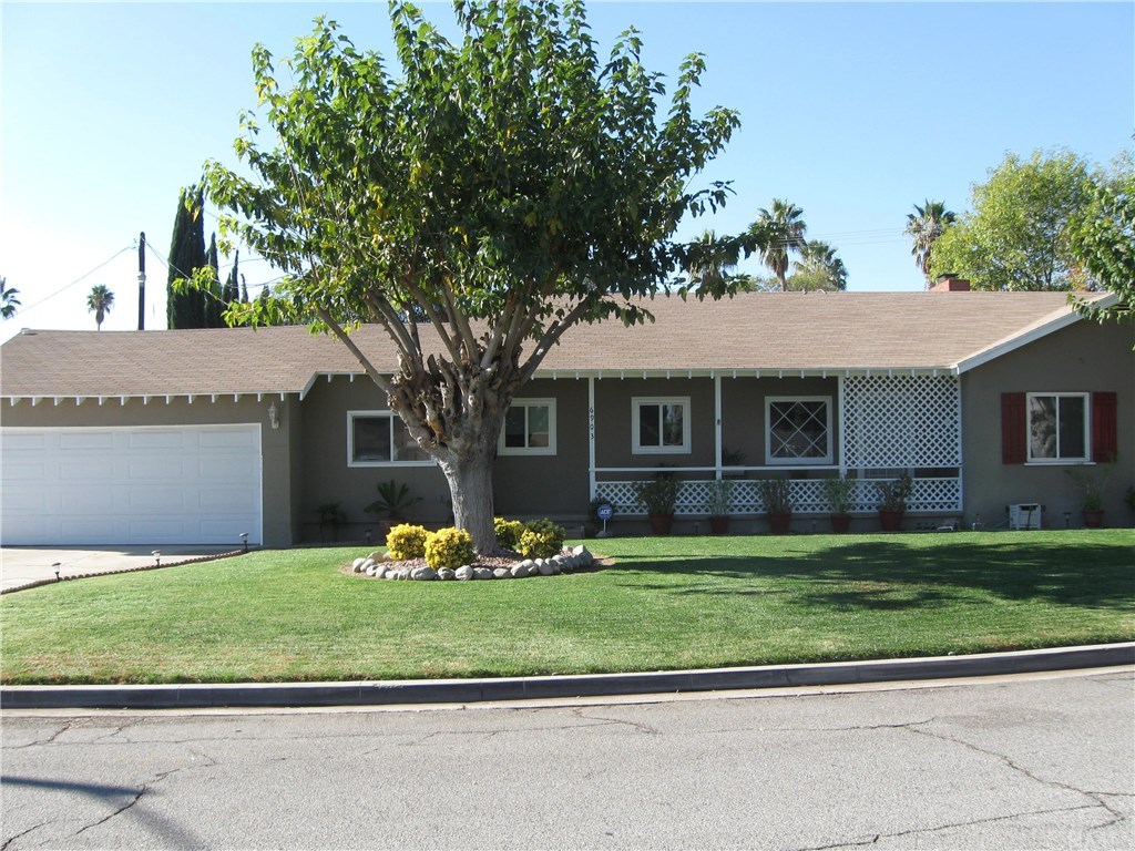 6903 Arbor Drive Riverside, CA 92504 - Photo 1 of 1 a front view of a house with a yard