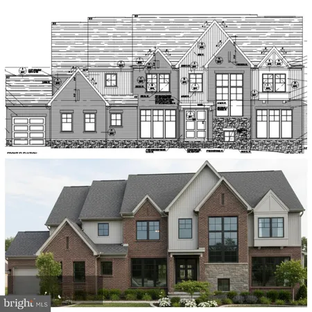 a front view of a residential apartment building with a yard