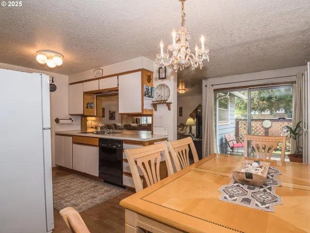 a very nice looking dining room with a large window