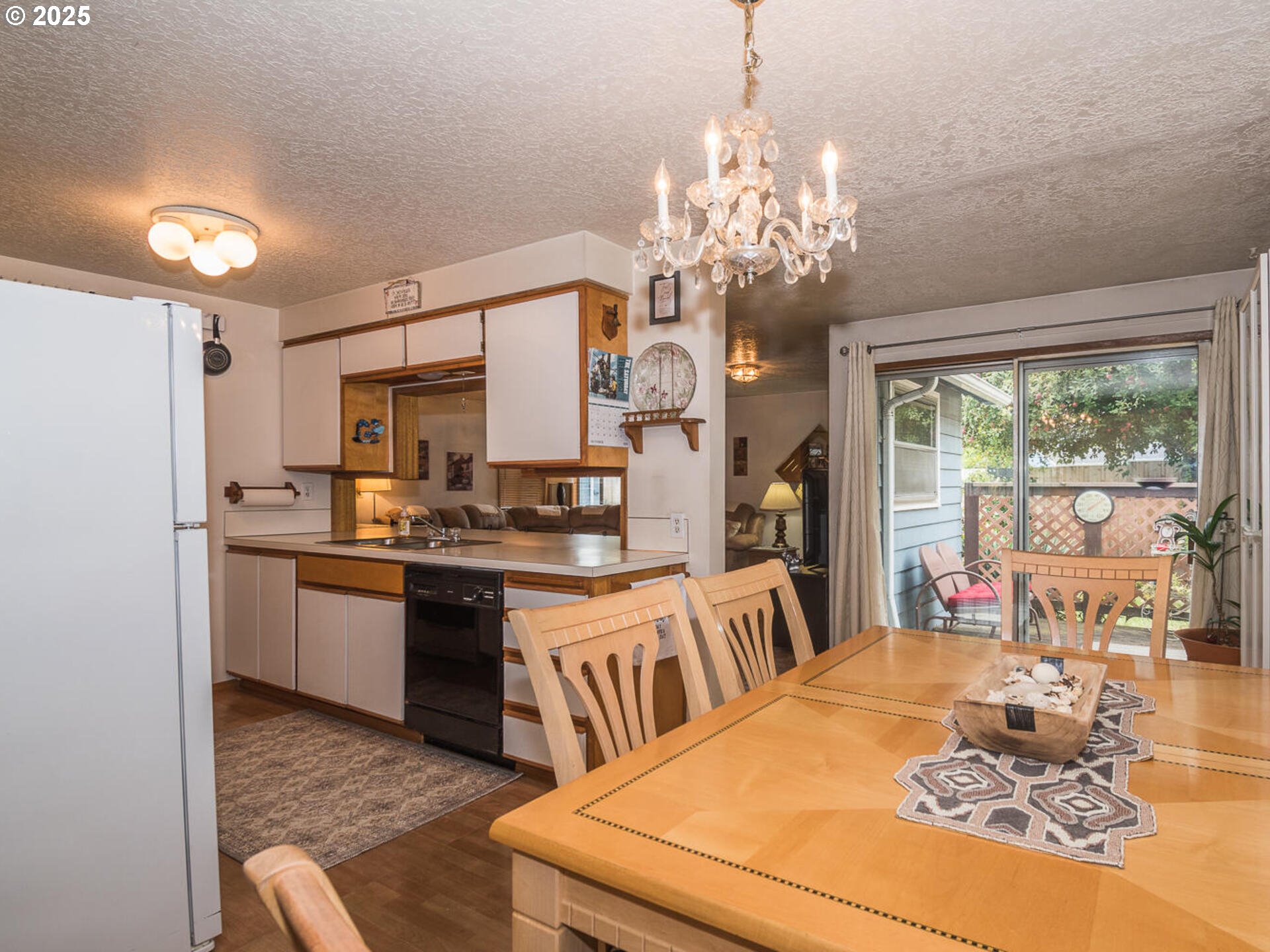 2068 Northeast Juniper Court Gresham, OR 97030 - Photo 11 of 42 a very nice looking dining room with a large window