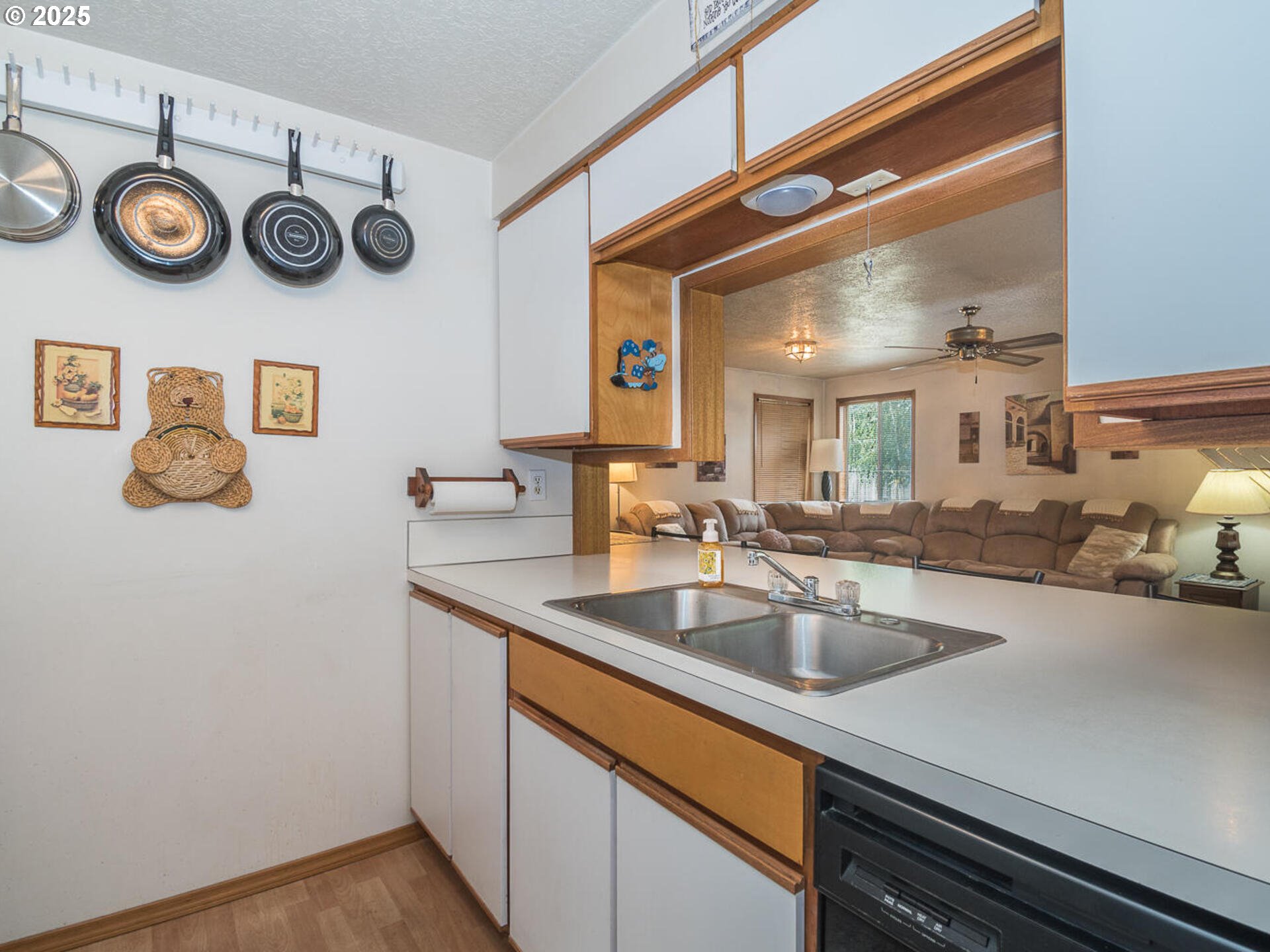 2068 Northeast Juniper Court Gresham, OR 97030 - Photo 14 of 42 a kitchen with a sink and cabinets