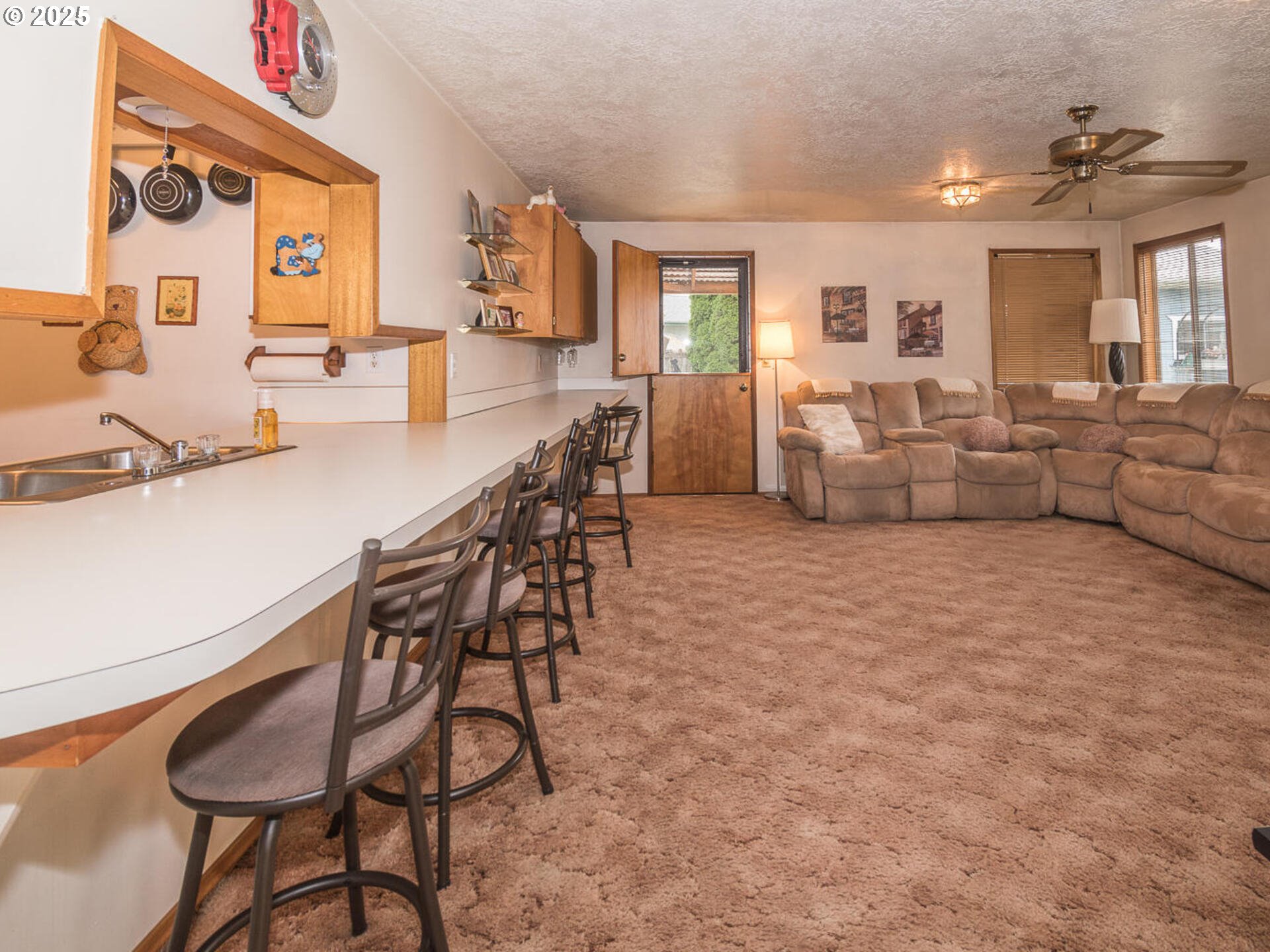 2068 Northeast Juniper Court Gresham, OR 97030 - Photo 16 of 42 a living room with furniture and a table