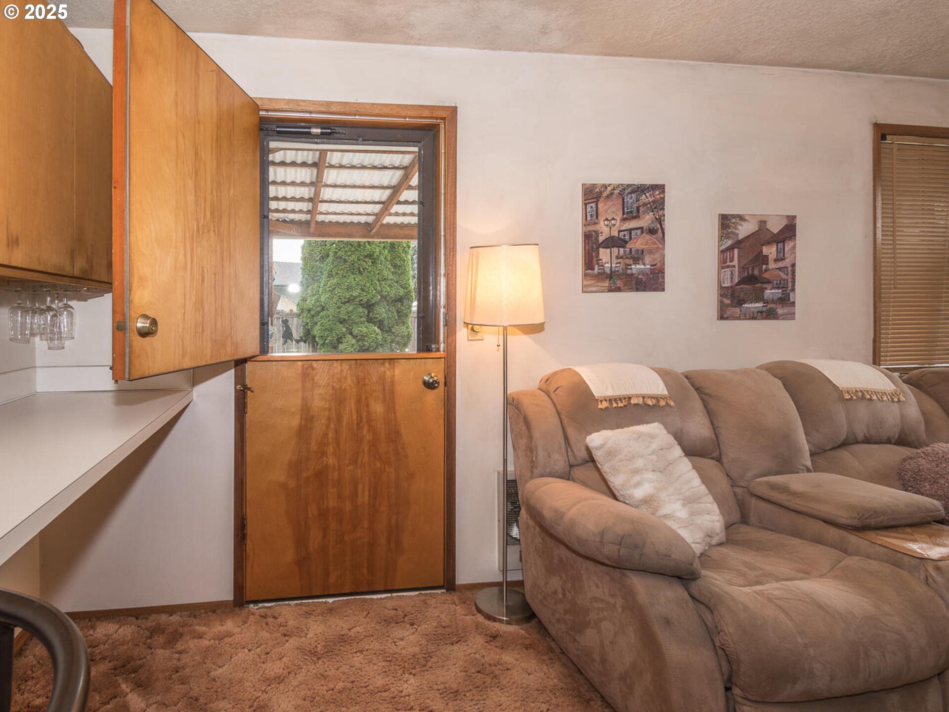 2068 Northeast Juniper Court Gresham, OR 97030 - Photo 17 of 42 a living room with furniture and a window