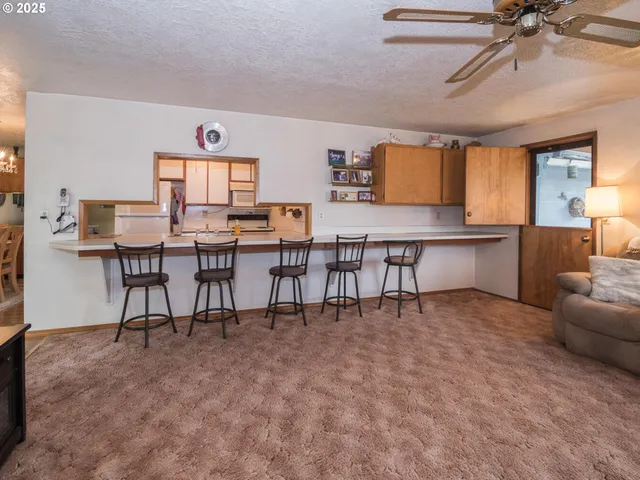 a view of a workspace with furniture
