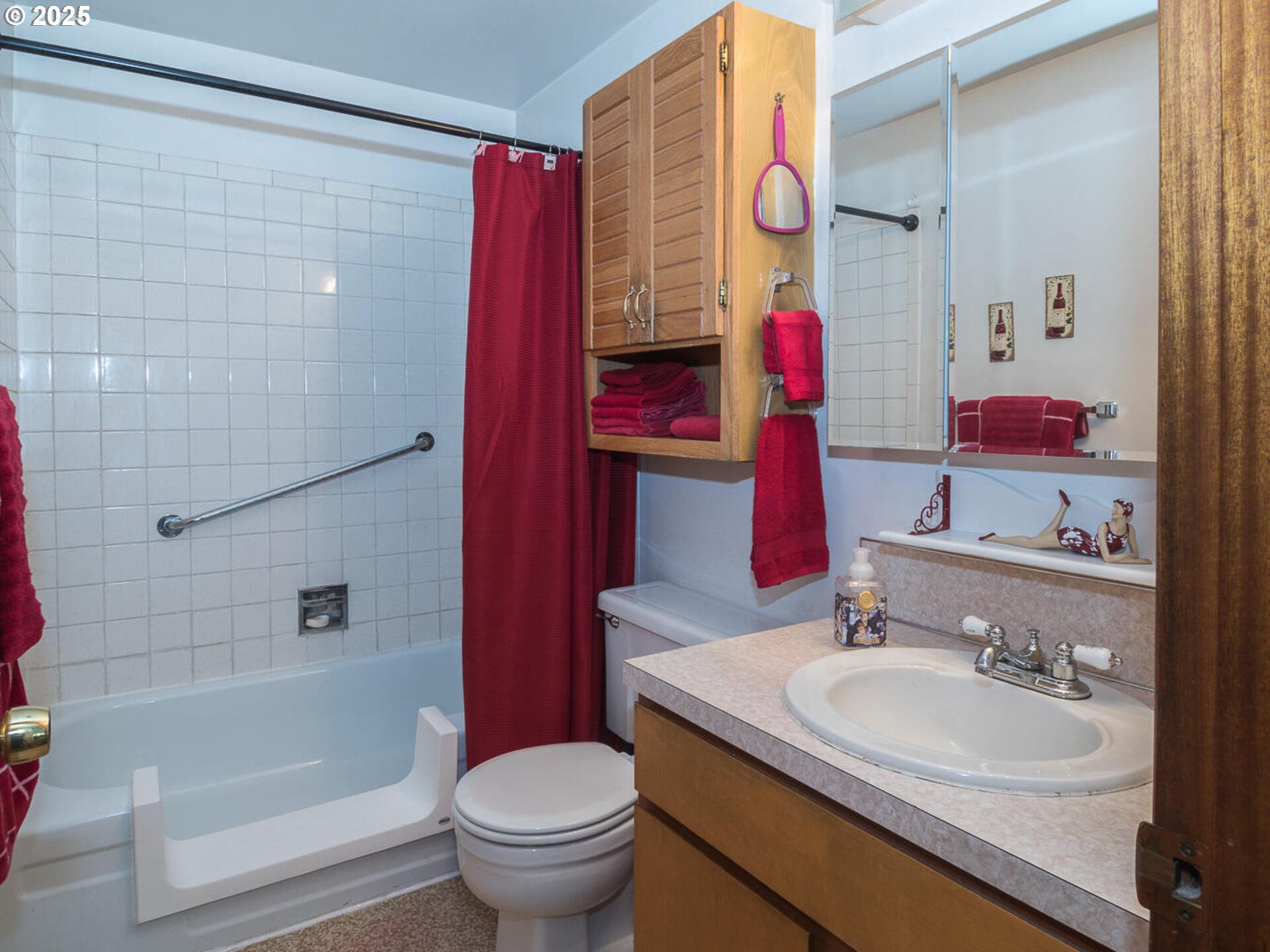 2068 Northeast Juniper Court Gresham, OR 97030 - Photo 21 of 42 a bathroom with a sink toilet and shower