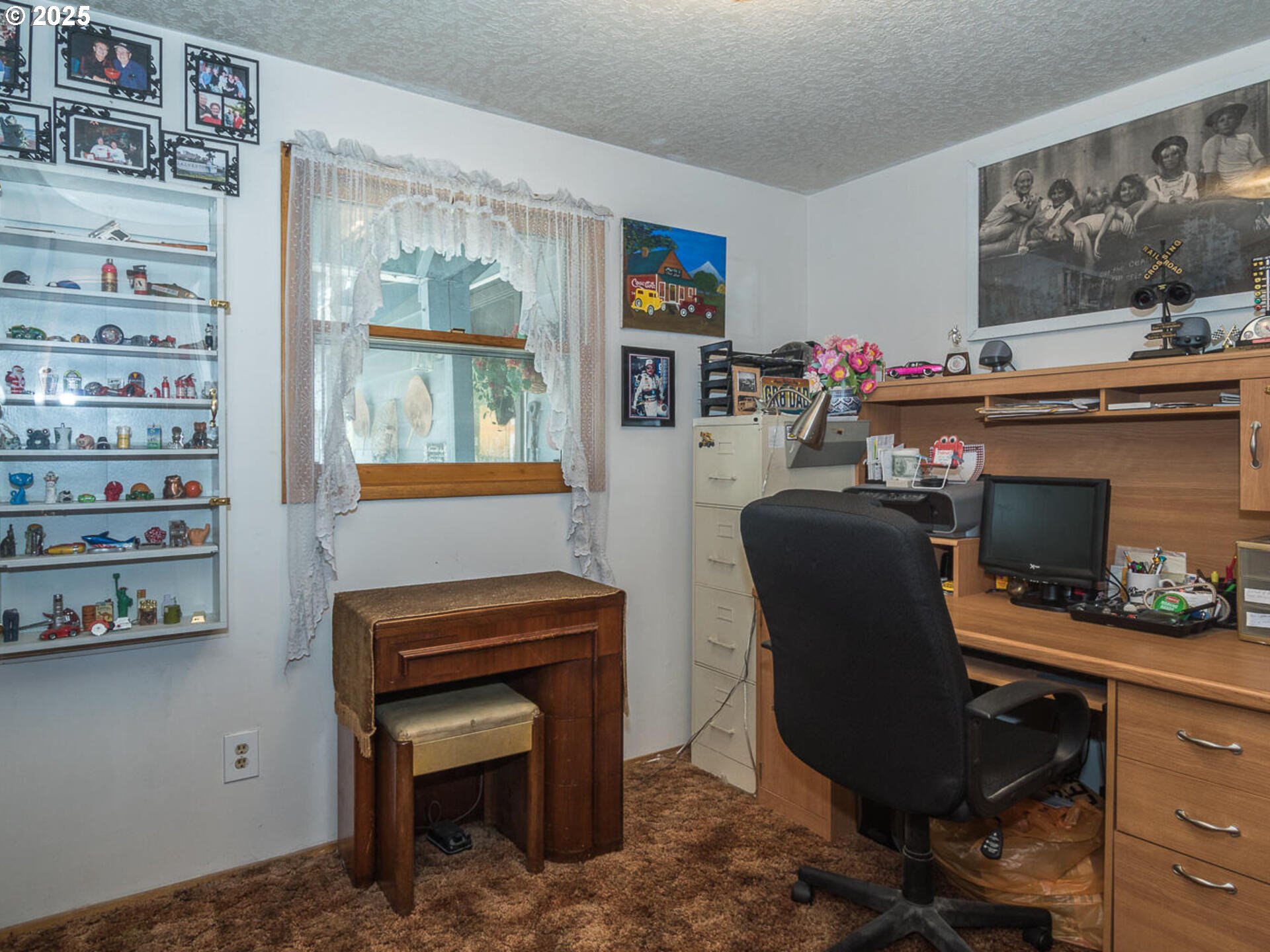 2068 Northeast Juniper Court Gresham, OR 97030 - Photo 22 of 42 a work room with furniture a rug and a window