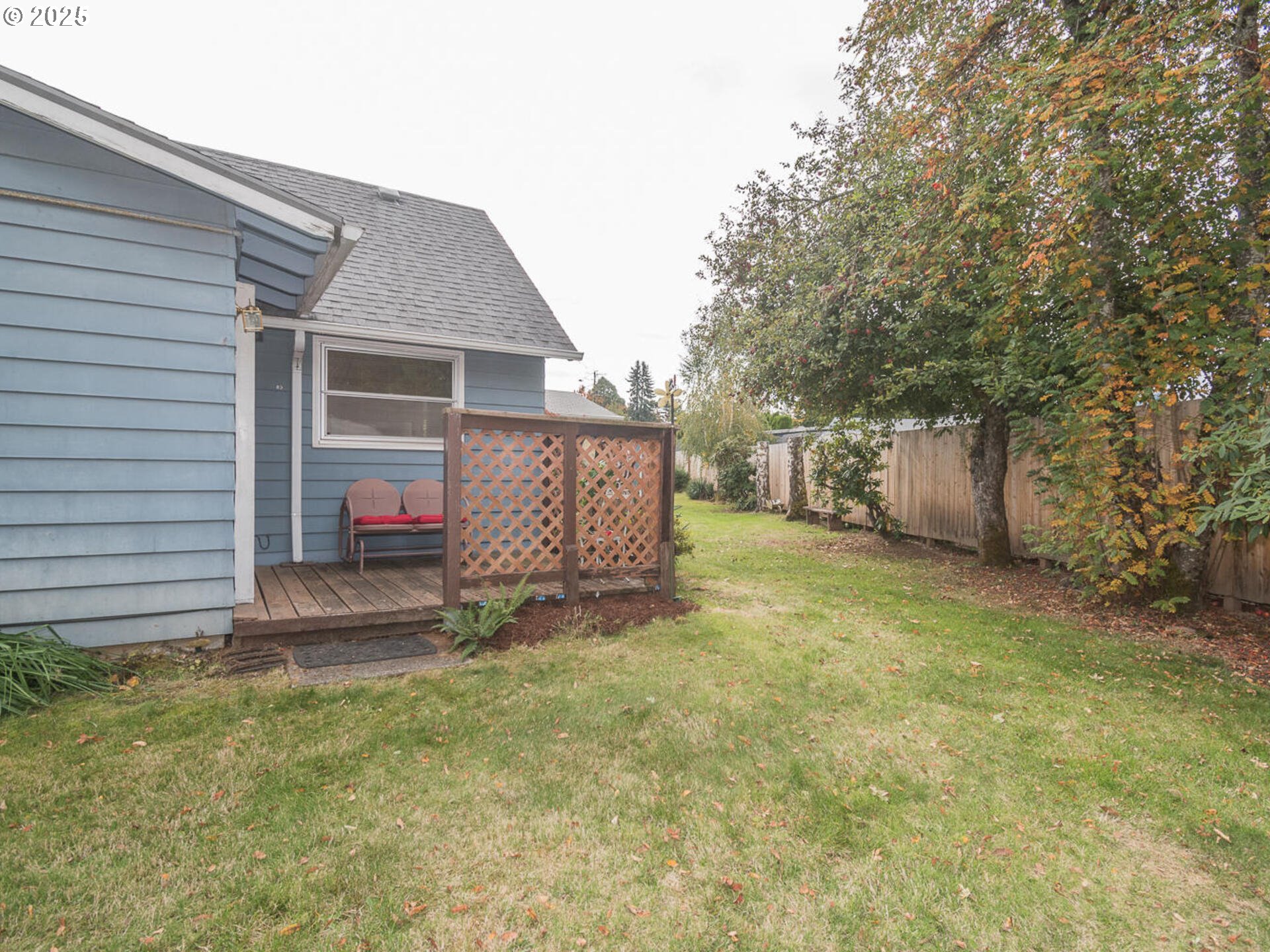 2068 Northeast Juniper Court Gresham, OR 97030 - Photo 39 of 42 a view of a house with a yard and garage