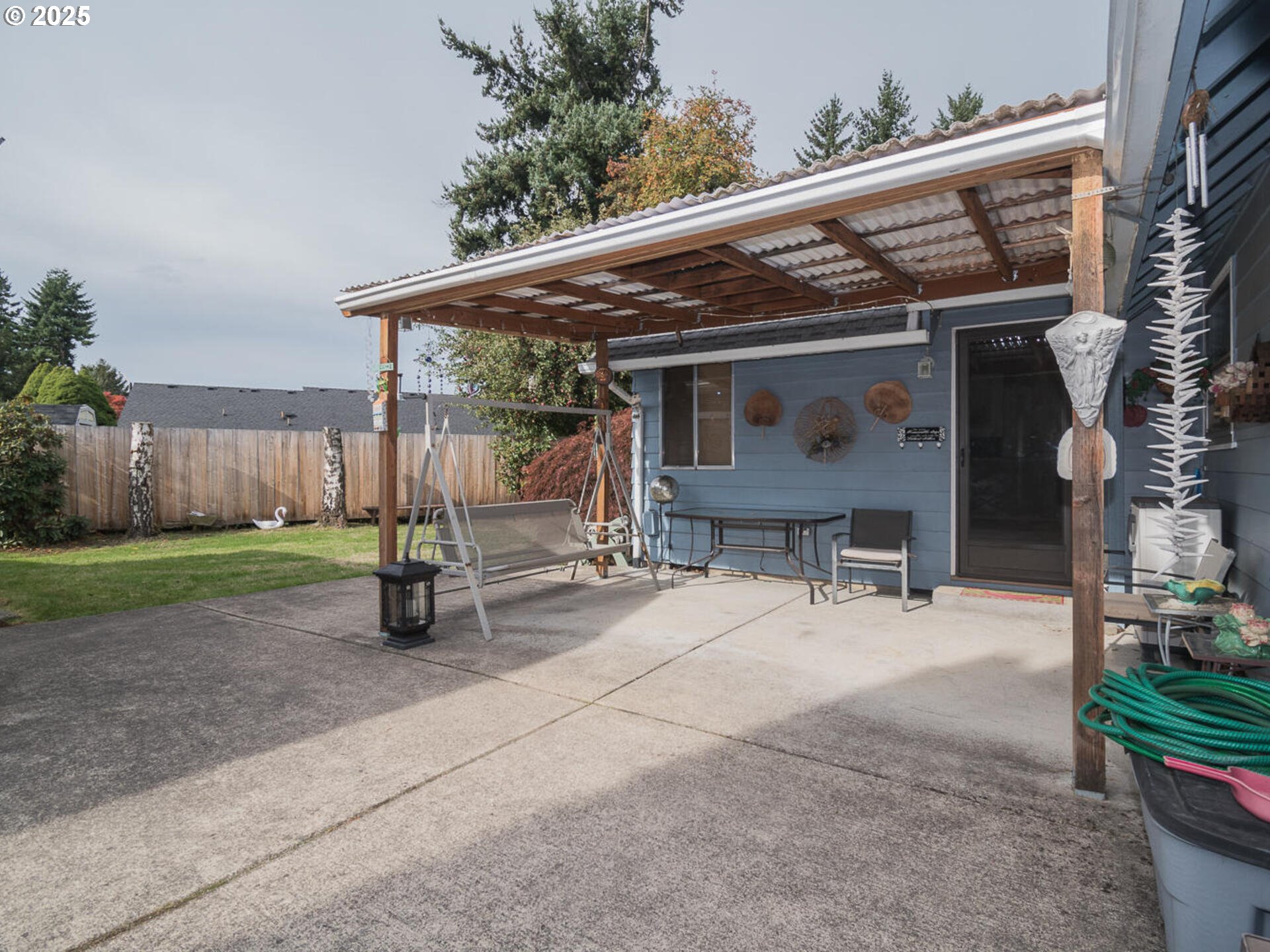 2068 Northeast Juniper Court Gresham, OR 97030 - Photo 40 of 42 a view of a house with backyard and sitting area