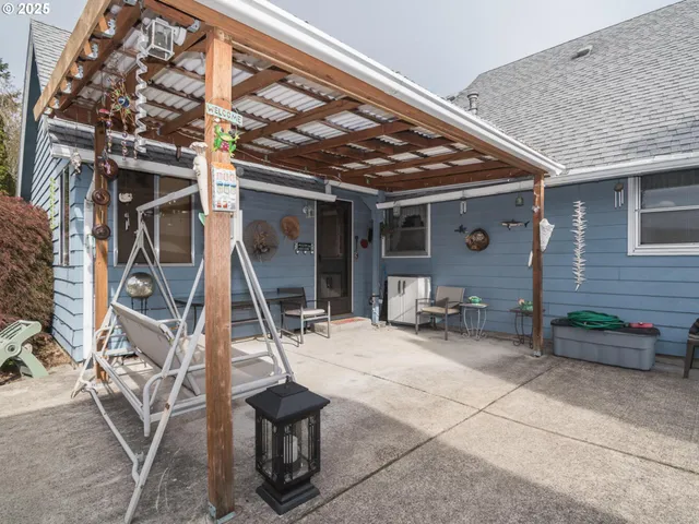 a view of a porch with a bench