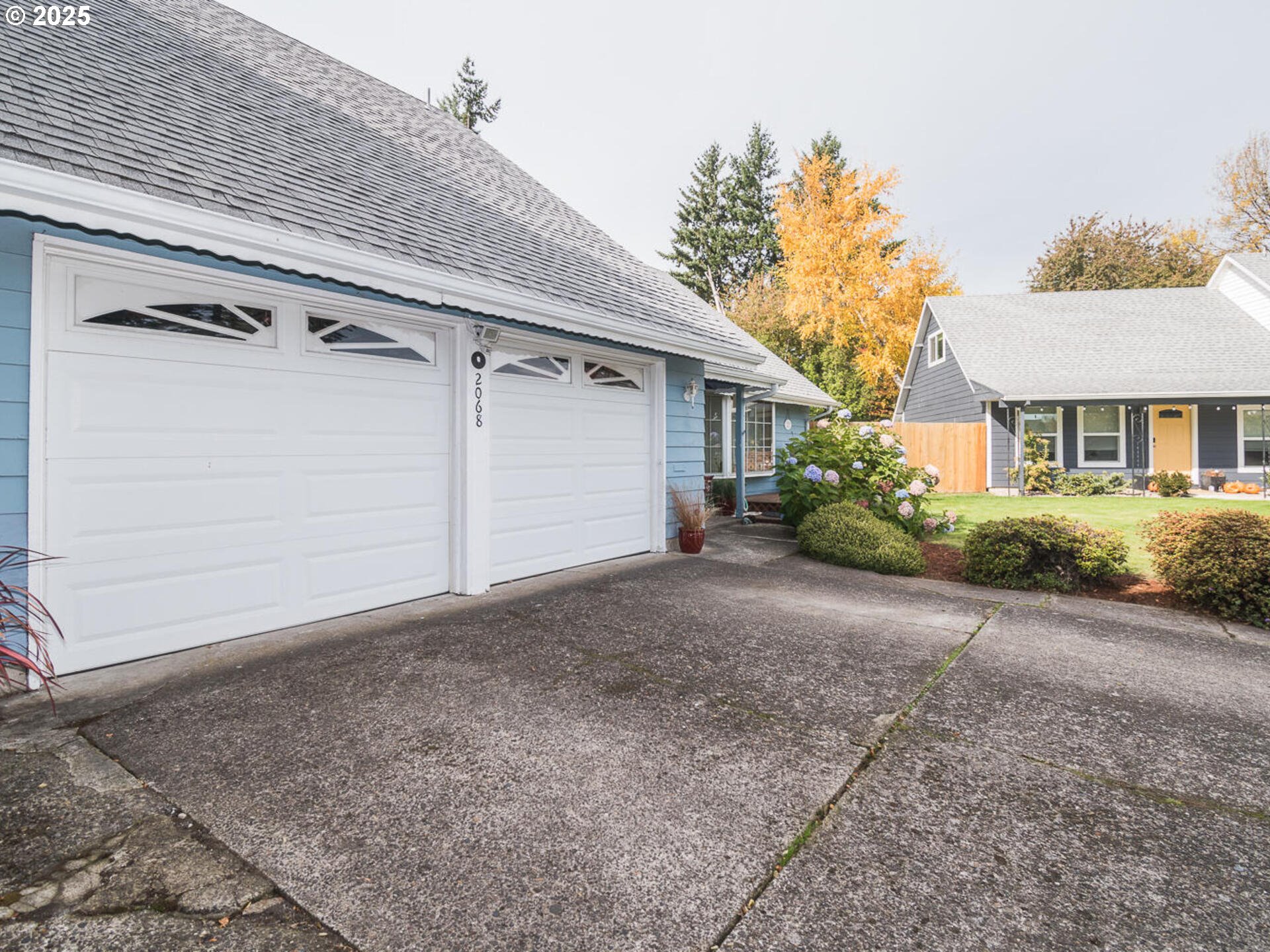 2068 Northeast Juniper Court Gresham, OR 97030 - Photo 5 of 42 a view of a house with a yard