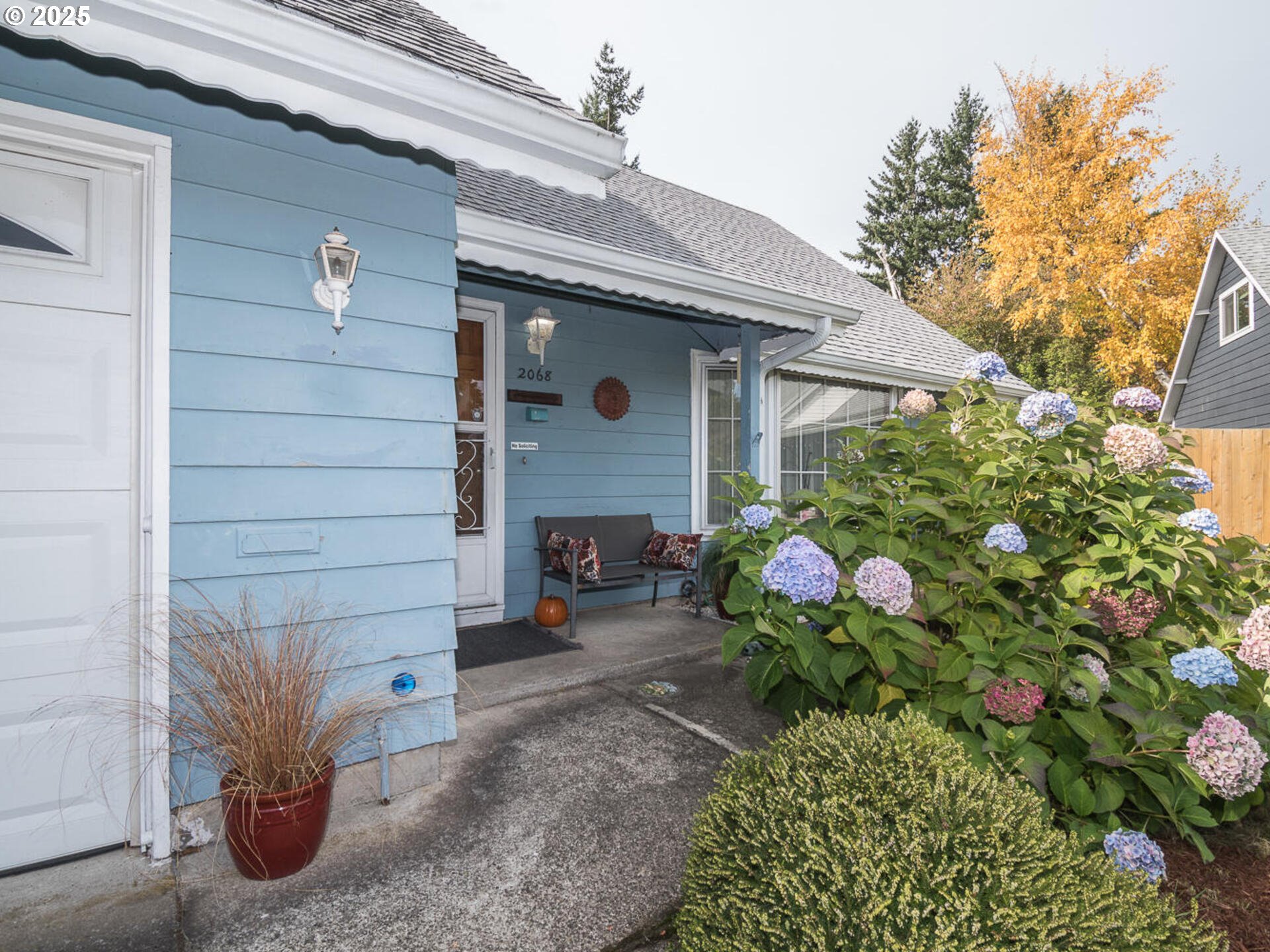 2068 Northeast Juniper Court Gresham, OR 97030 - Photo 6 of 42 a front view of a house with patio