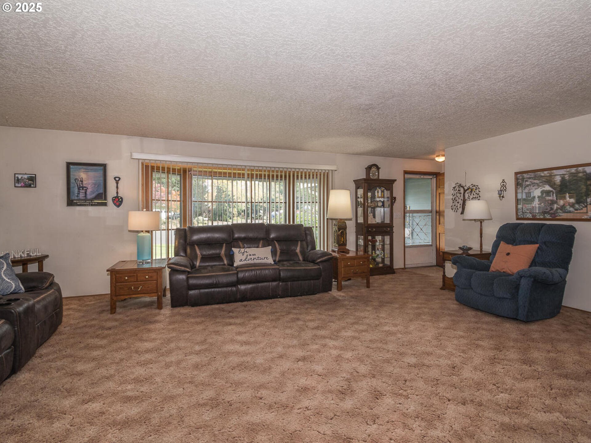 2068 Northeast Juniper Court Gresham, OR 97030 - Photo 9 of 42 a living room with furniture and a large window