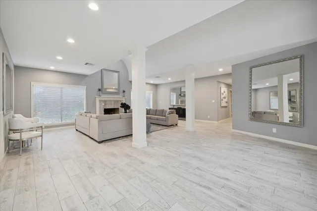 a view of kitchen with furniture and a refrigerator