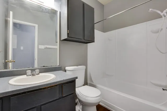 a bathroom with a sink toilet and a bathtub