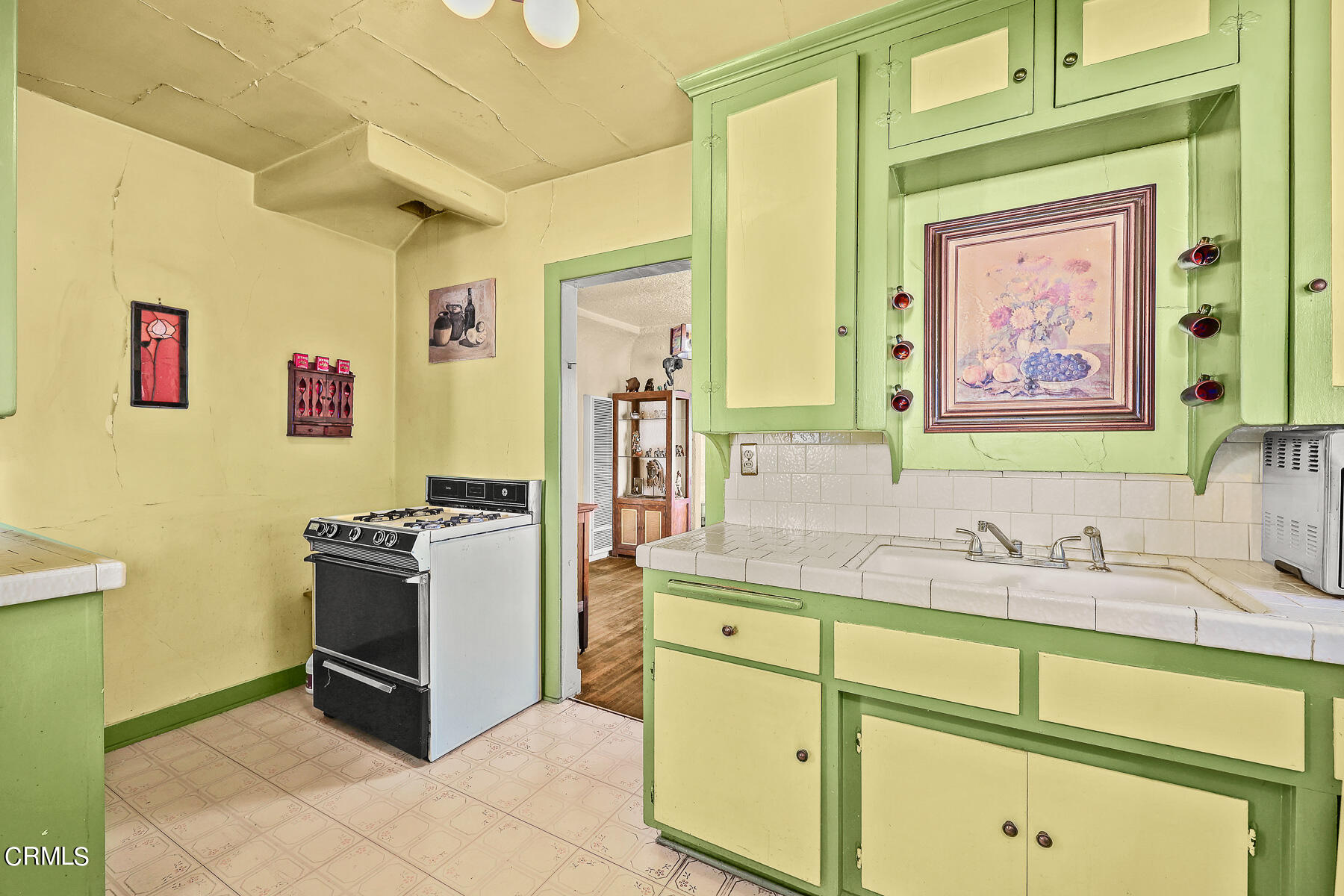 2536 Devonshire Lane Altadena, CA 91001 - Photo 15 of 32 a room with a sink and a refrigerator