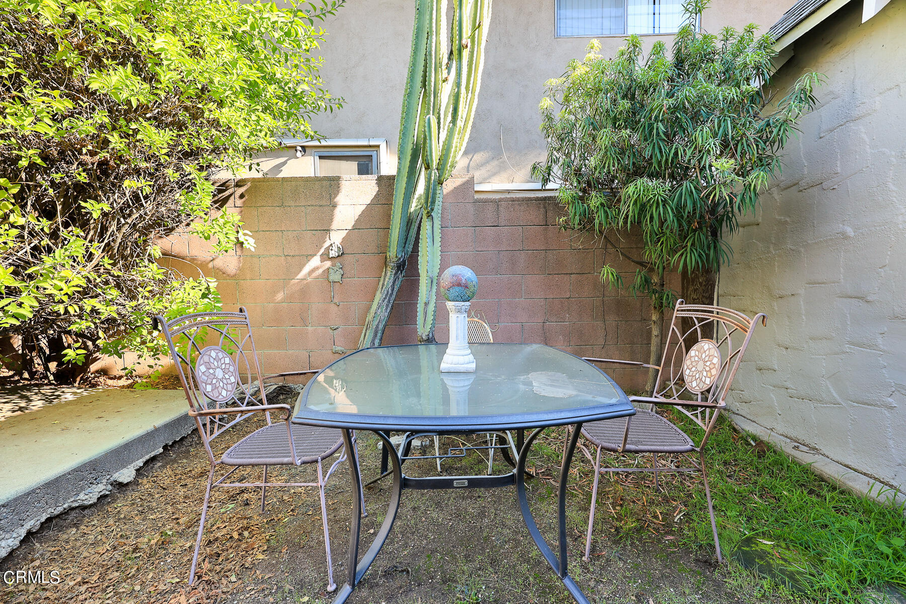 2536 Devonshire Lane Altadena, CA 91001 - Photo 24 of 32 a backyard of a house with table and chairs