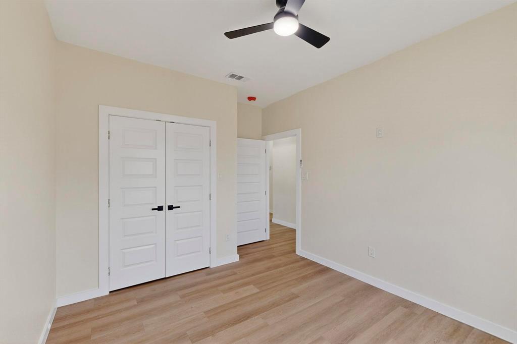 208 Rusk Street Rice, TX 75155 - Photo 25 of 27 wooden floor in an empty room