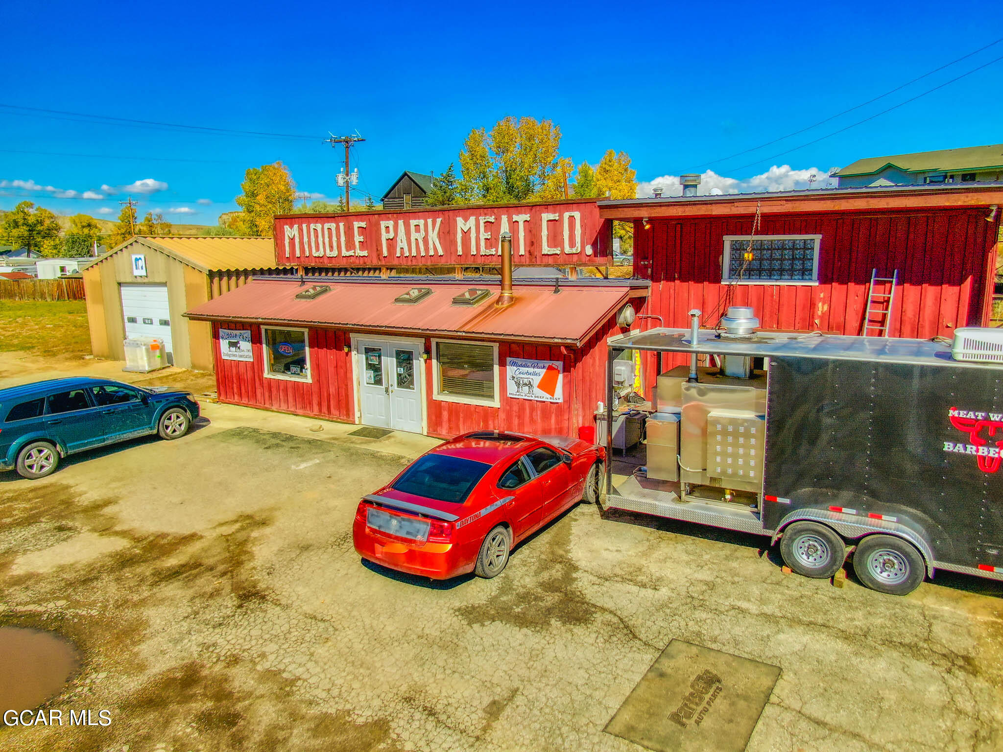 1107 Highway 9 Kremmling, CO 80459 - Photo 12 of 19 a view of a house with swimming pool and porch