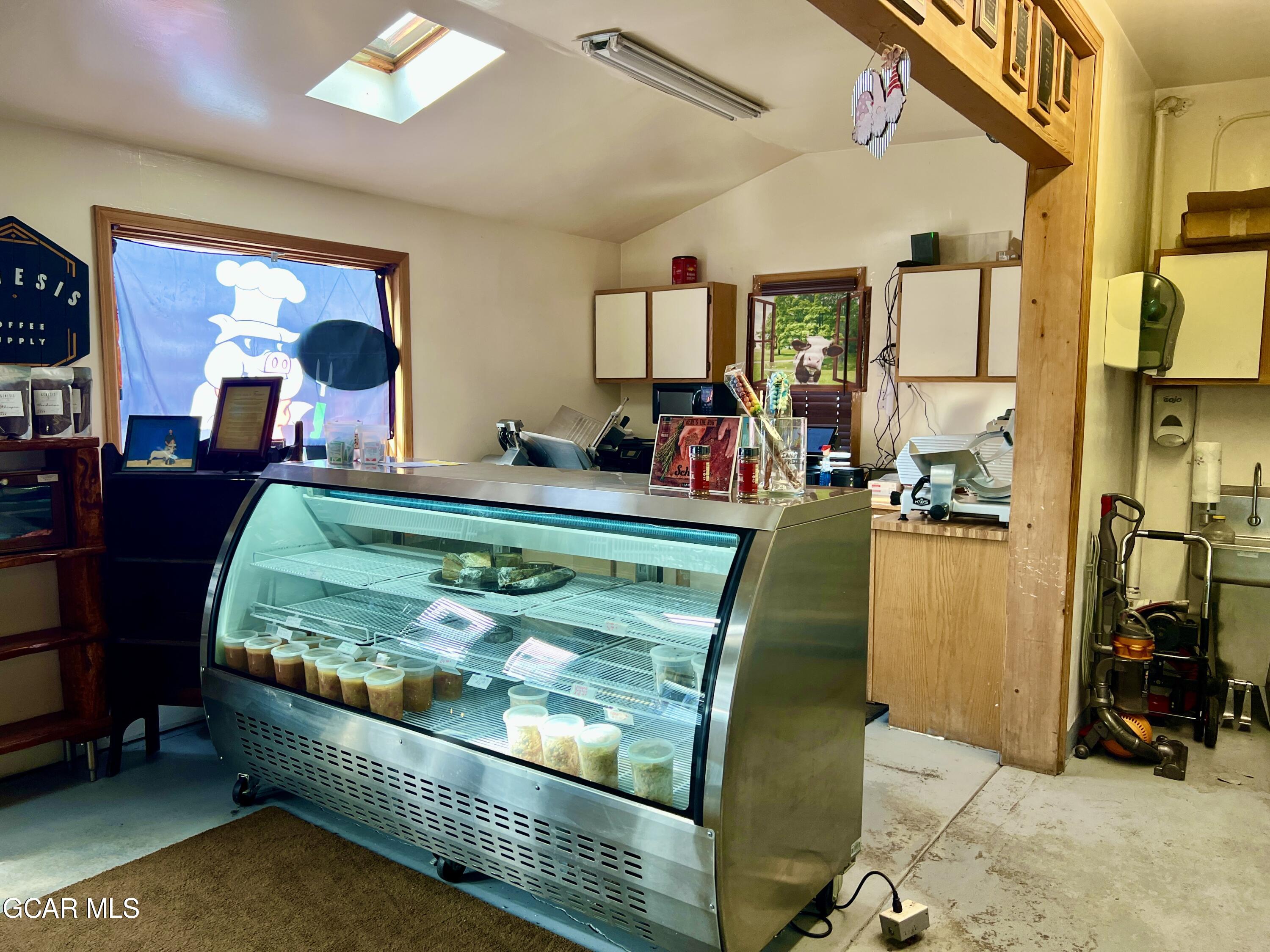 1107 Highway 9 Kremmling, CO 80459 - Photo 19 of 19 a bed room with a bed mirror and dresser