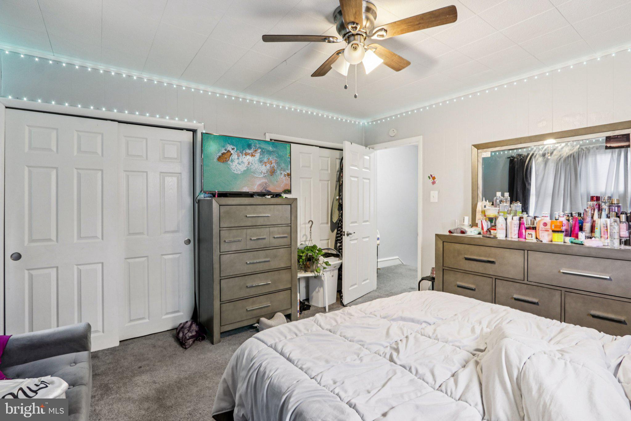 133 High Street Sharon Hill, PA 19079 - Photo 22 of 45 a bed room with a bed and a mirror