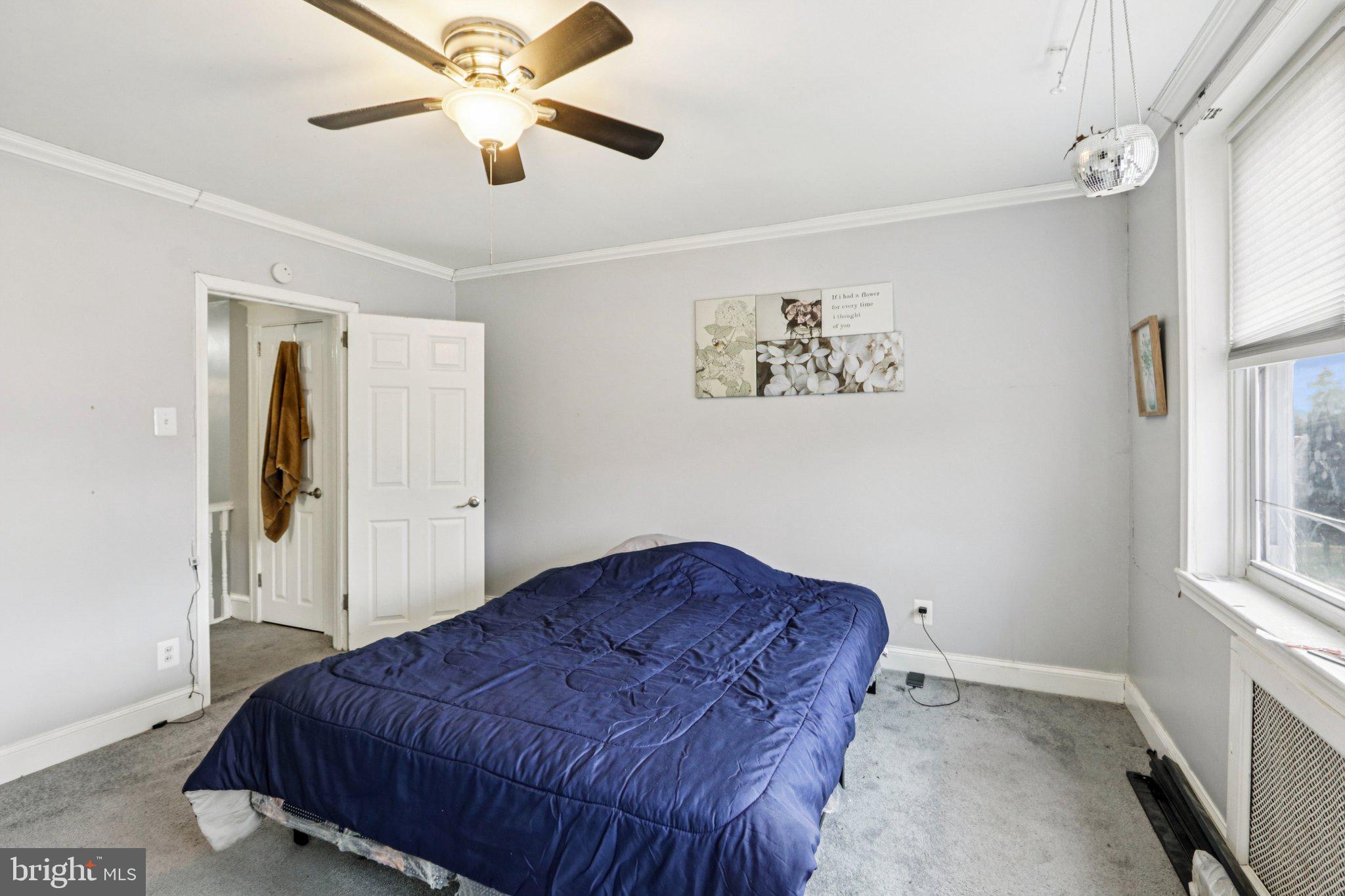 133 High Street Sharon Hill, PA 19079 - Photo 29 of 45 a bedroom with a bed and a window