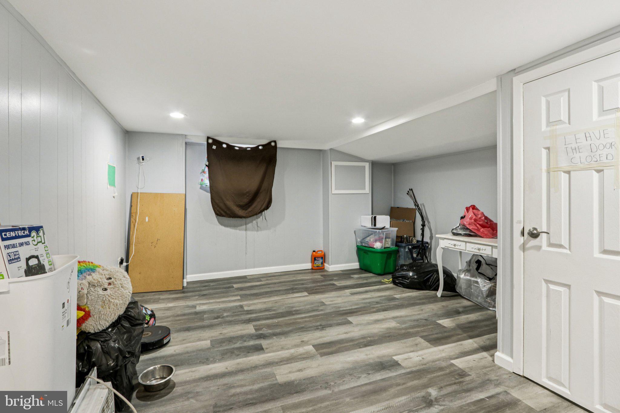 133 High Street Sharon Hill, PA 19079 - Photo 31 of 45 a bed room with a bed mirror and a window