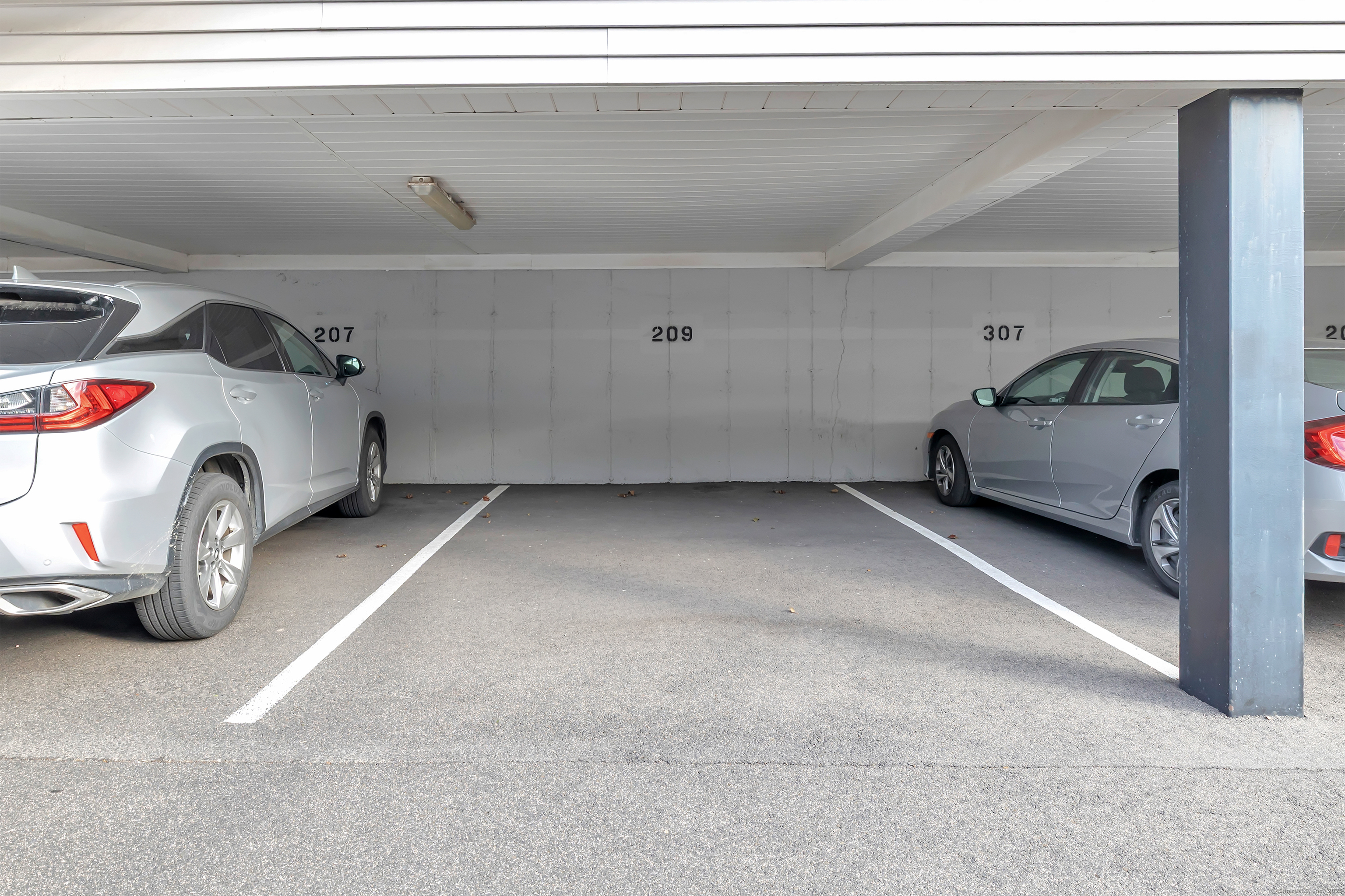 155 Short Beach Road, Unit 209 Stratford, CT 06615 - Photo 13 of 22 a view of parking garage